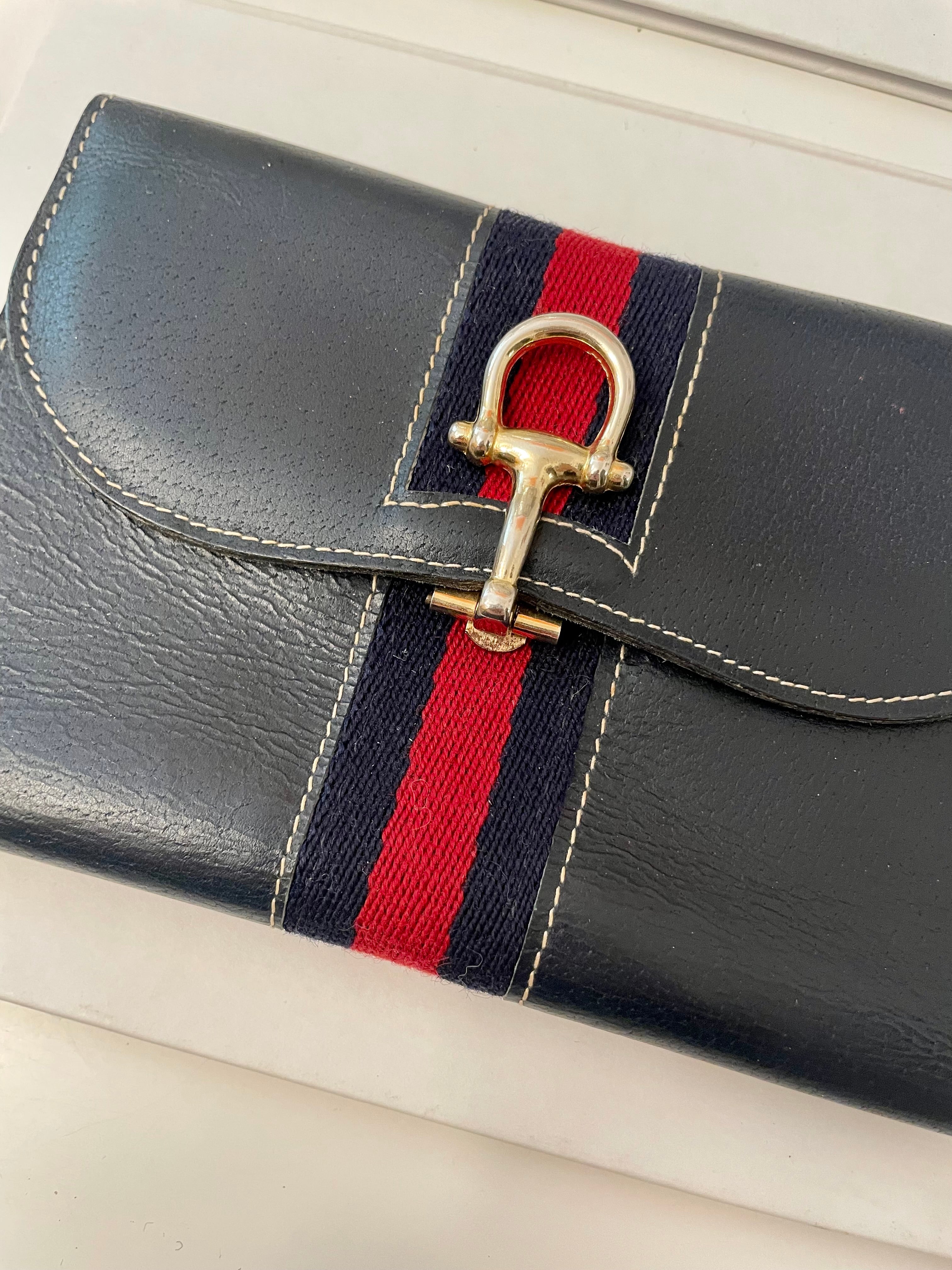 The Preppy Girl Society... they love the classic navy, and red story... This wallet brings their love for that color palette to whole new level!