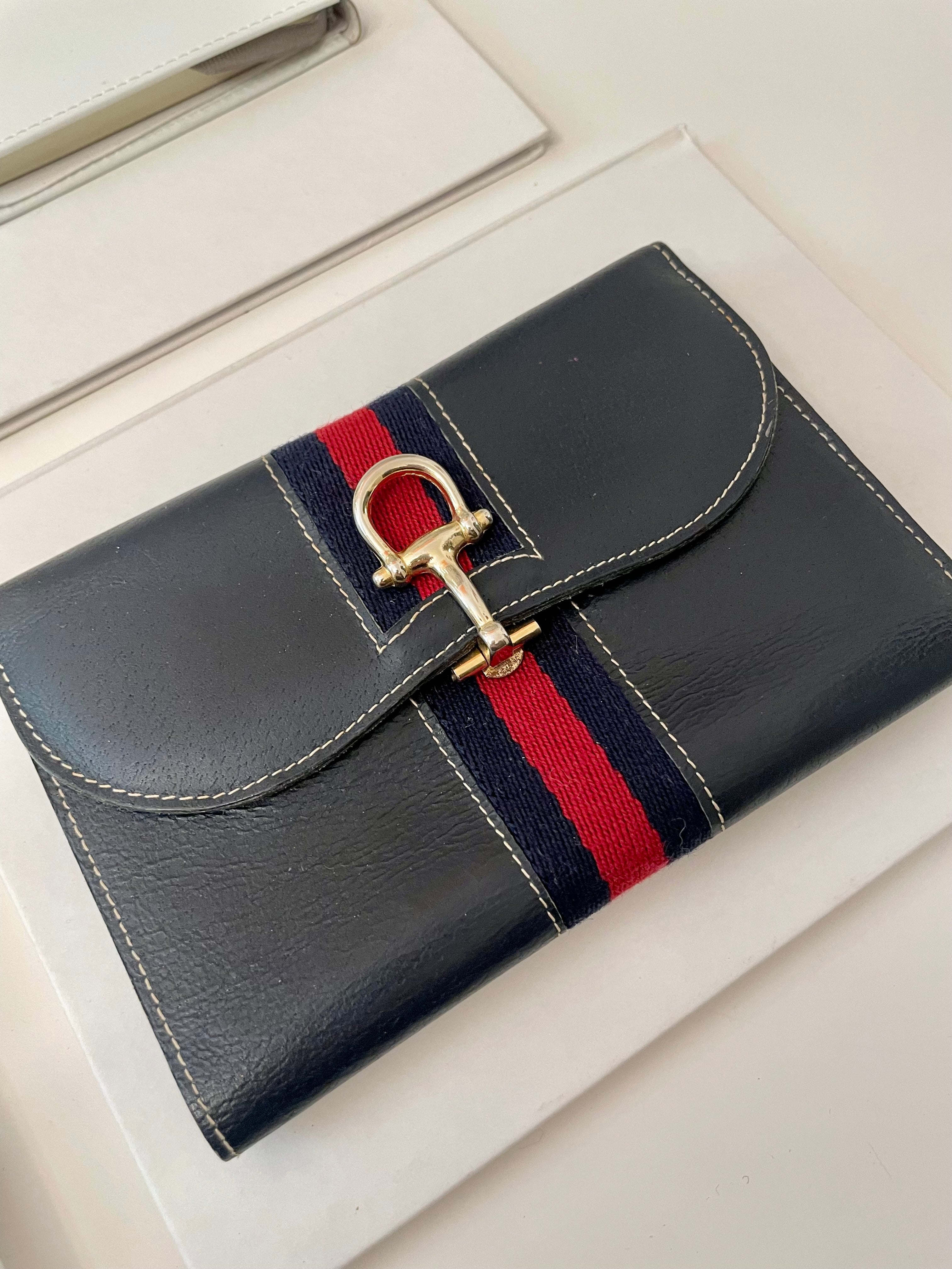 The Preppy Girl Society... they love the classic navy, and red story... This wallet brings their love for that color palette to whole new level!