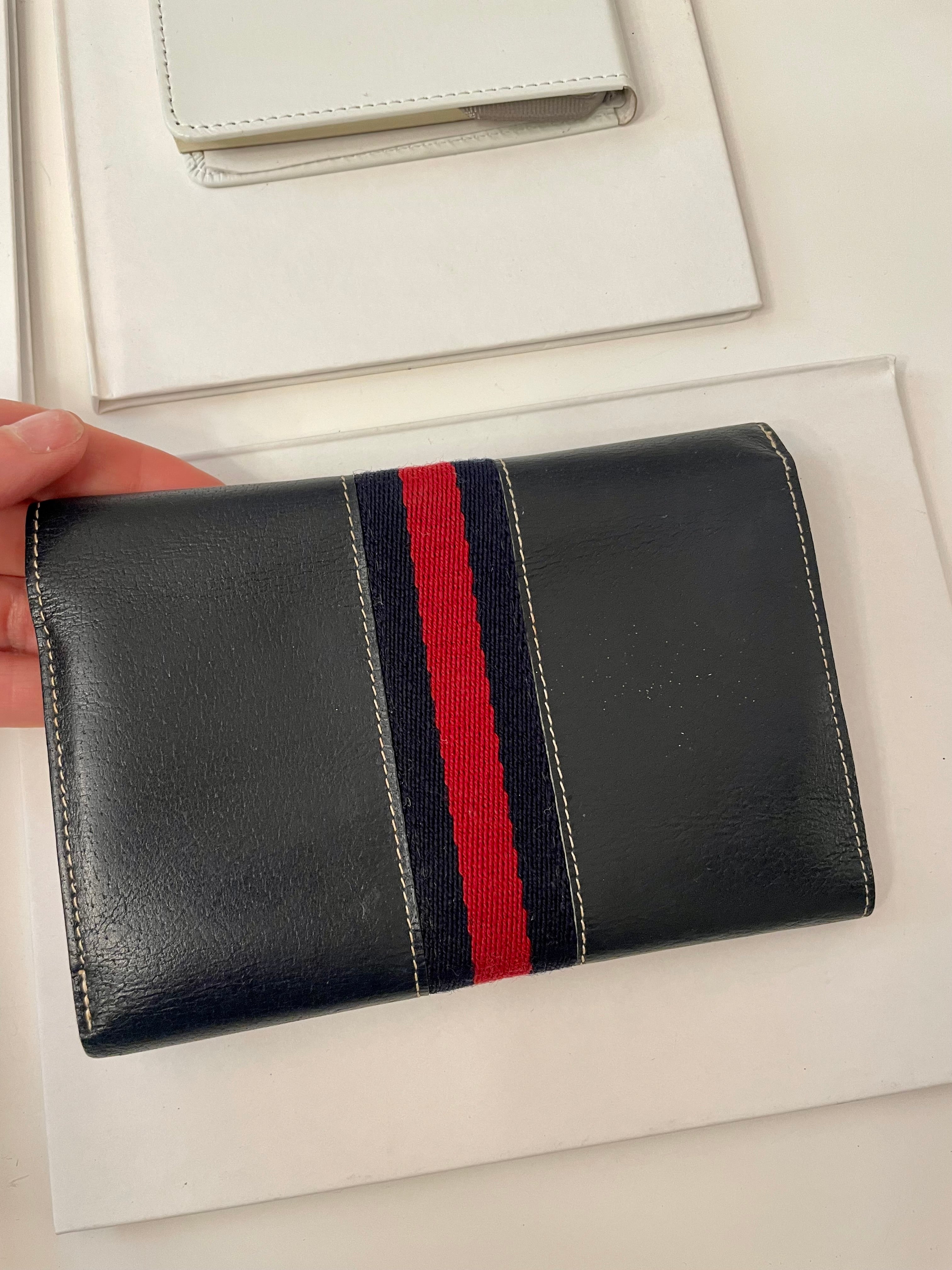 The Preppy Girl Society... they love the classic navy, and red story... This wallet brings their love for that color palette to whole new level!