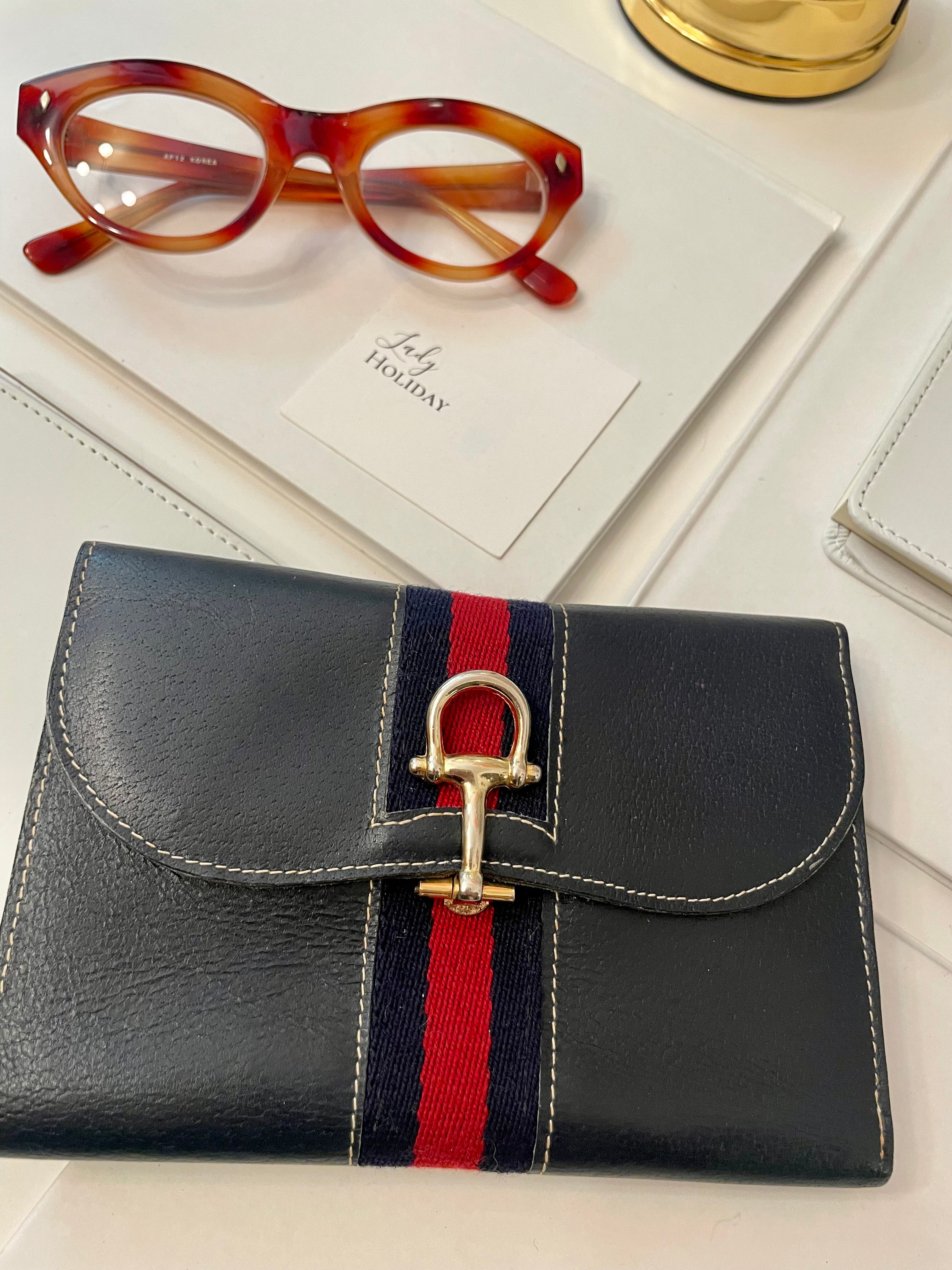 The Preppy Girl Society... they love the classic navy, and red story... This wallet brings their love for that color palette to whole new level!