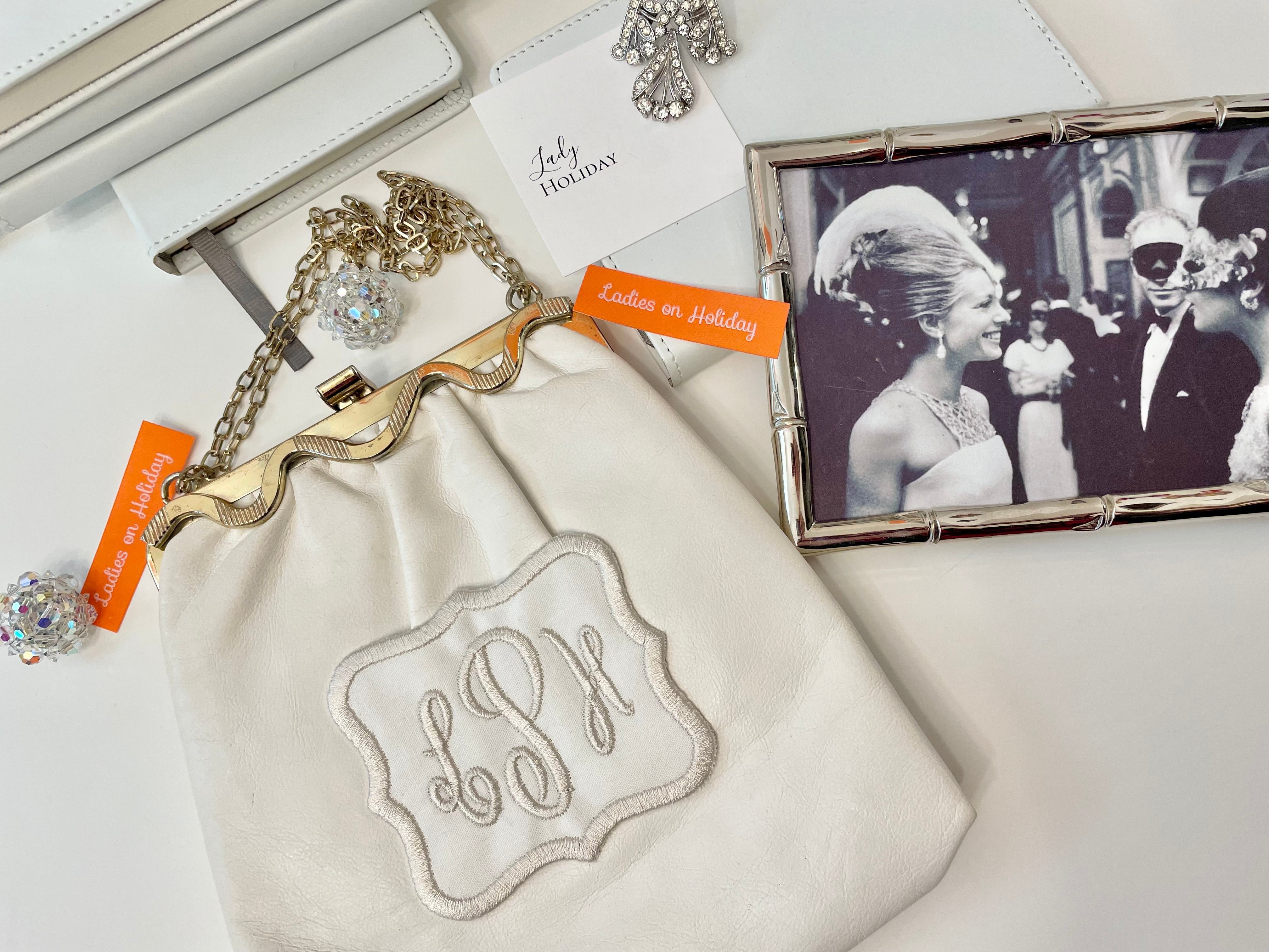 Ladies On Holiday... custom vintage clutch bags adorned with a monogram....