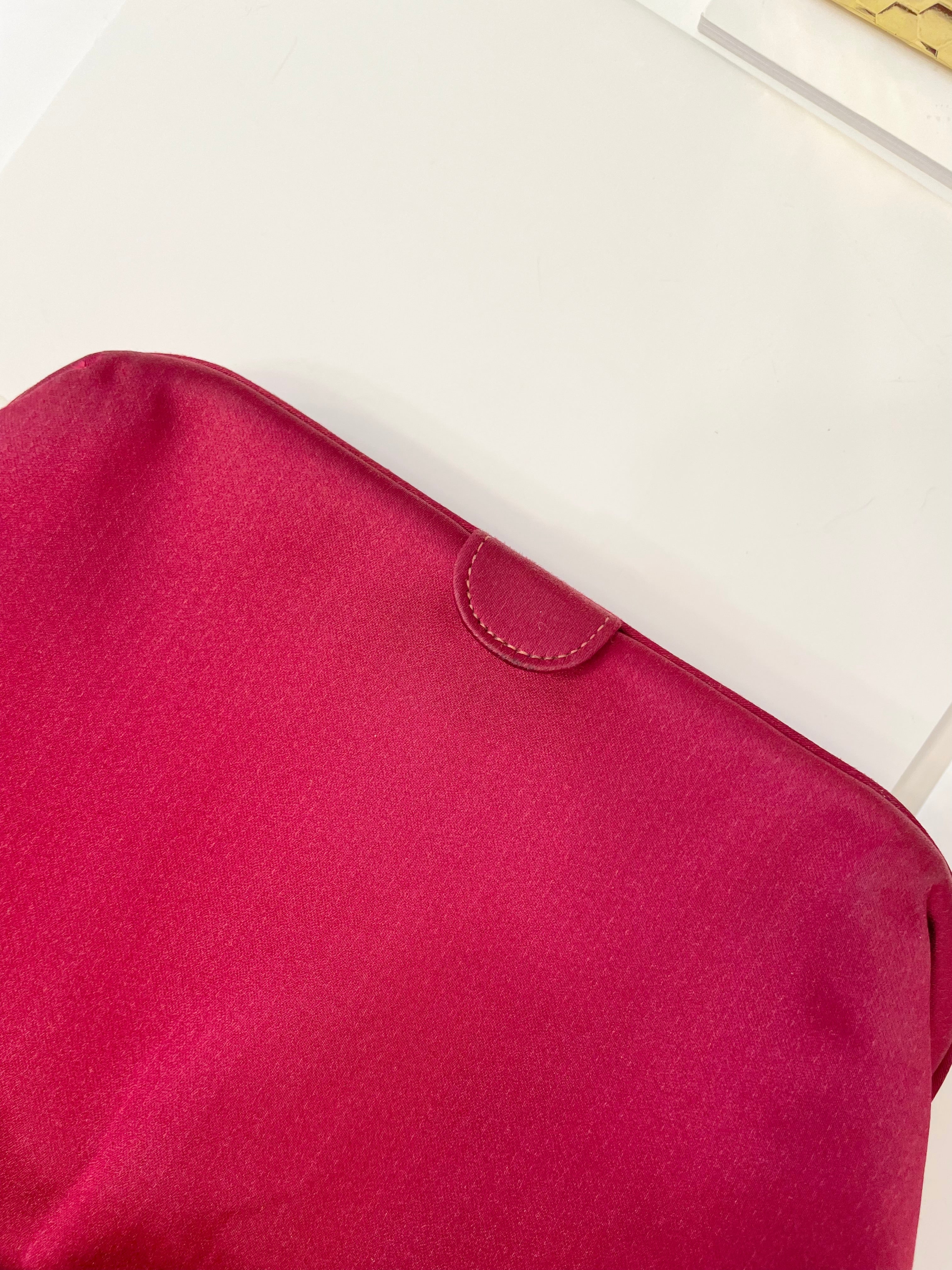 The most chic magenta satin and silk clutch bag.... the color is so rich