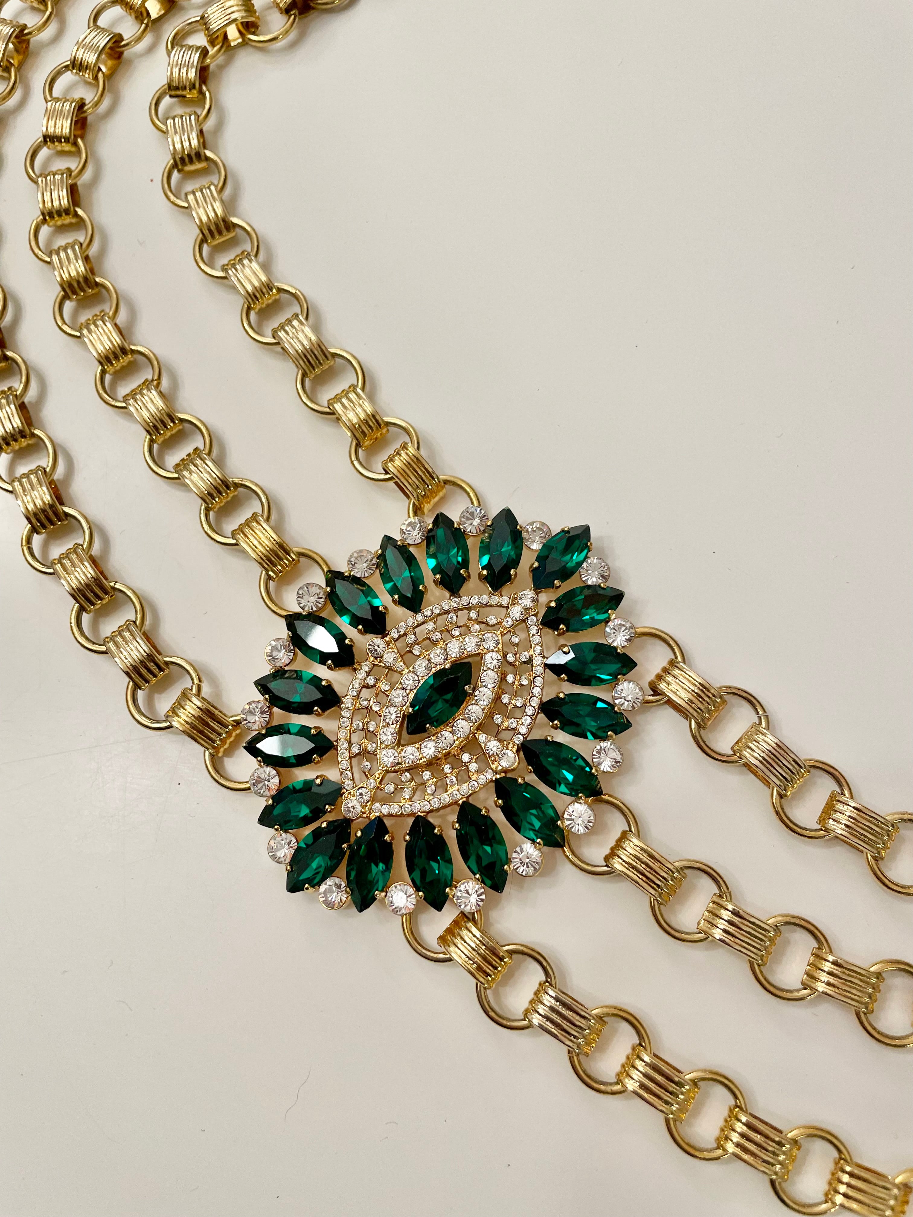 The Socialite ... sporting this divine Dolce and Gabbana emerald glass stone chain belt. Couture!!!