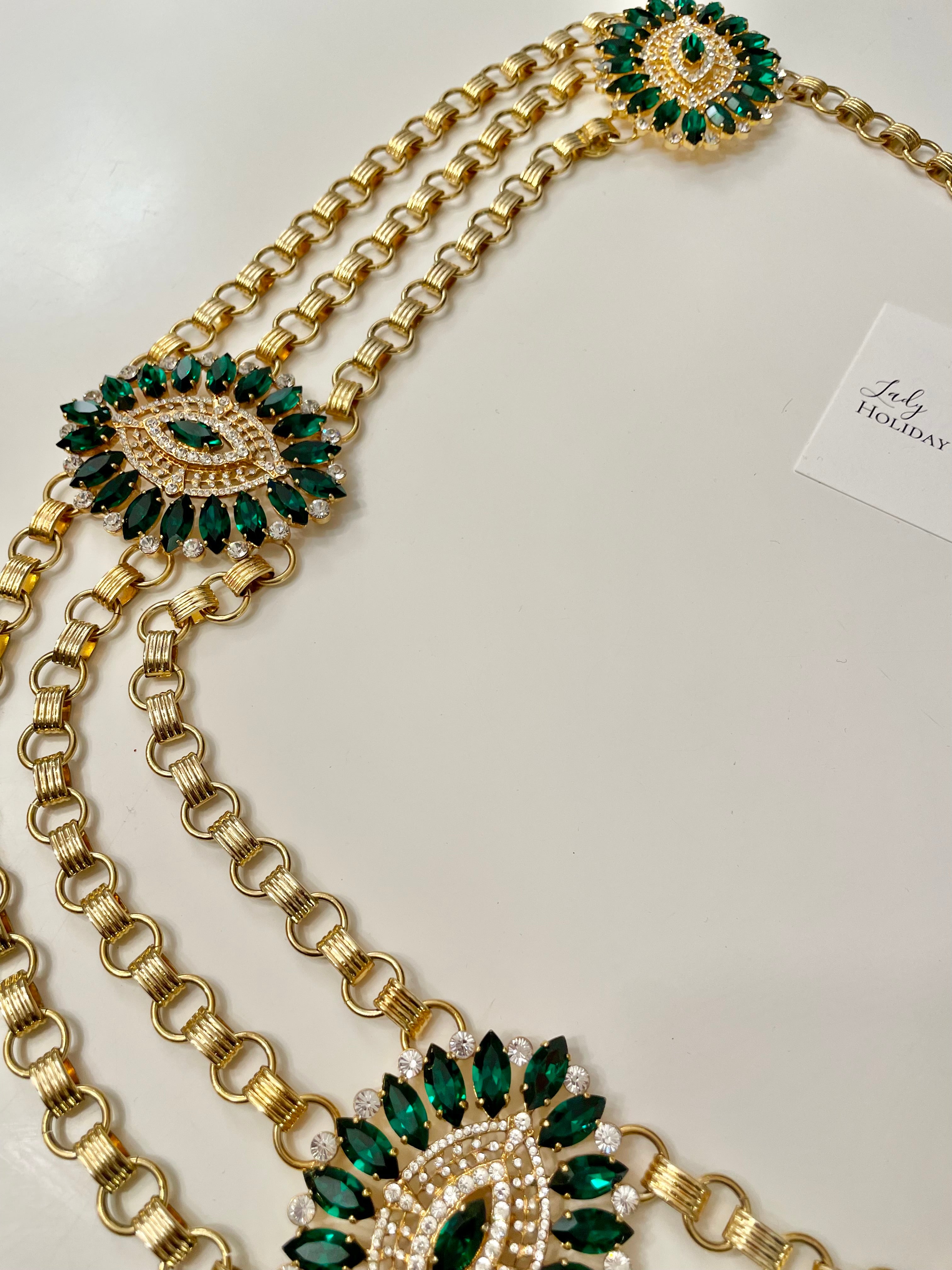 The Socialite ... sporting this divine Dolce and Gabbana emerald glass stone chain belt. Couture!!!