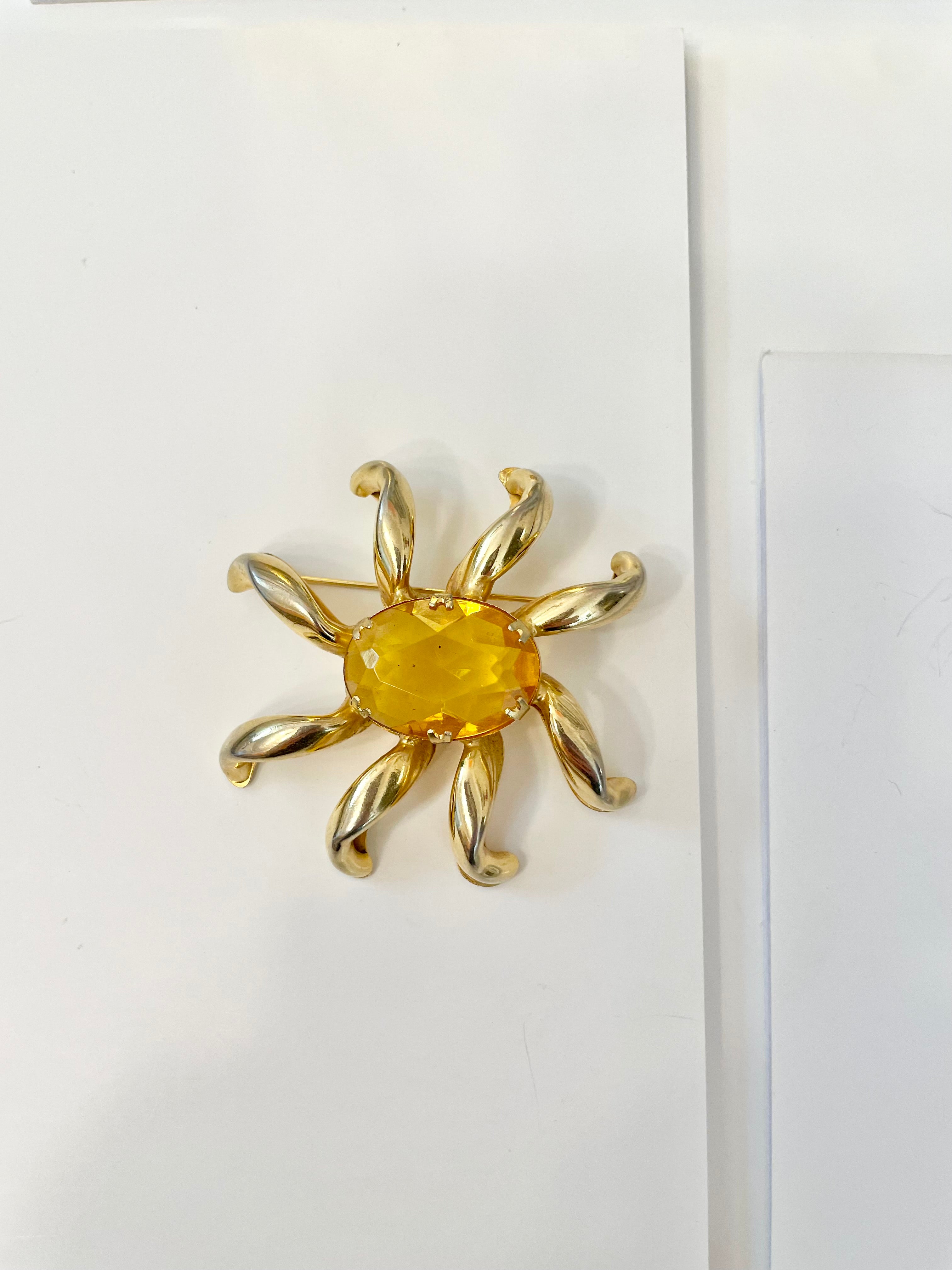 The most divine citrine glass, starburst gold classy brooch...