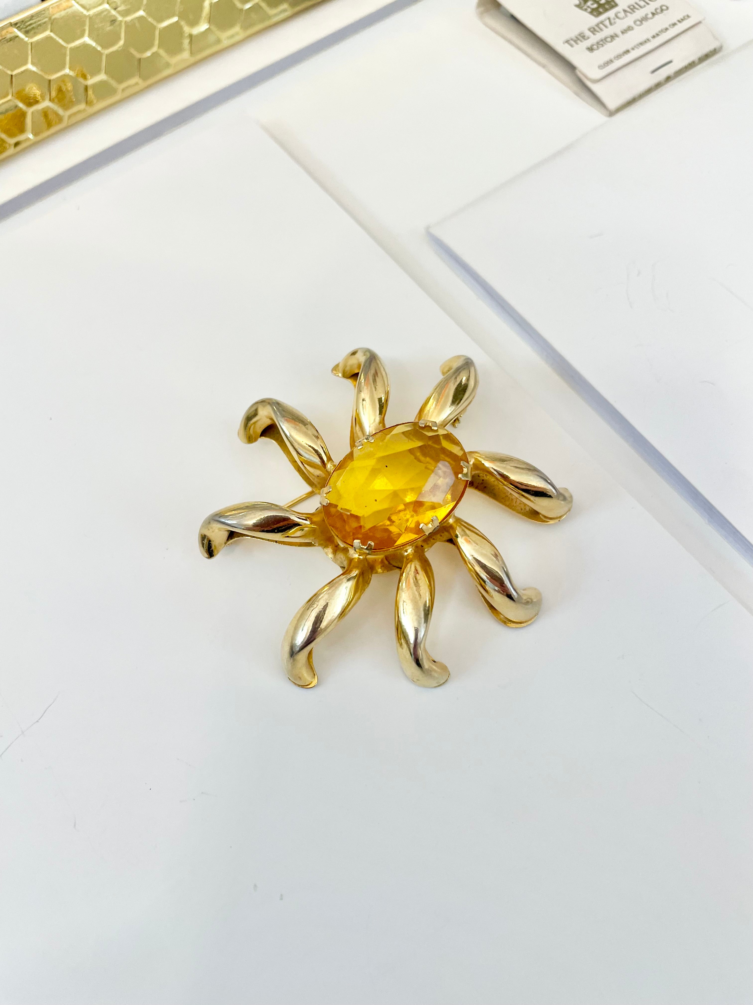 The most divine citrine glass, starburst gold classy brooch...