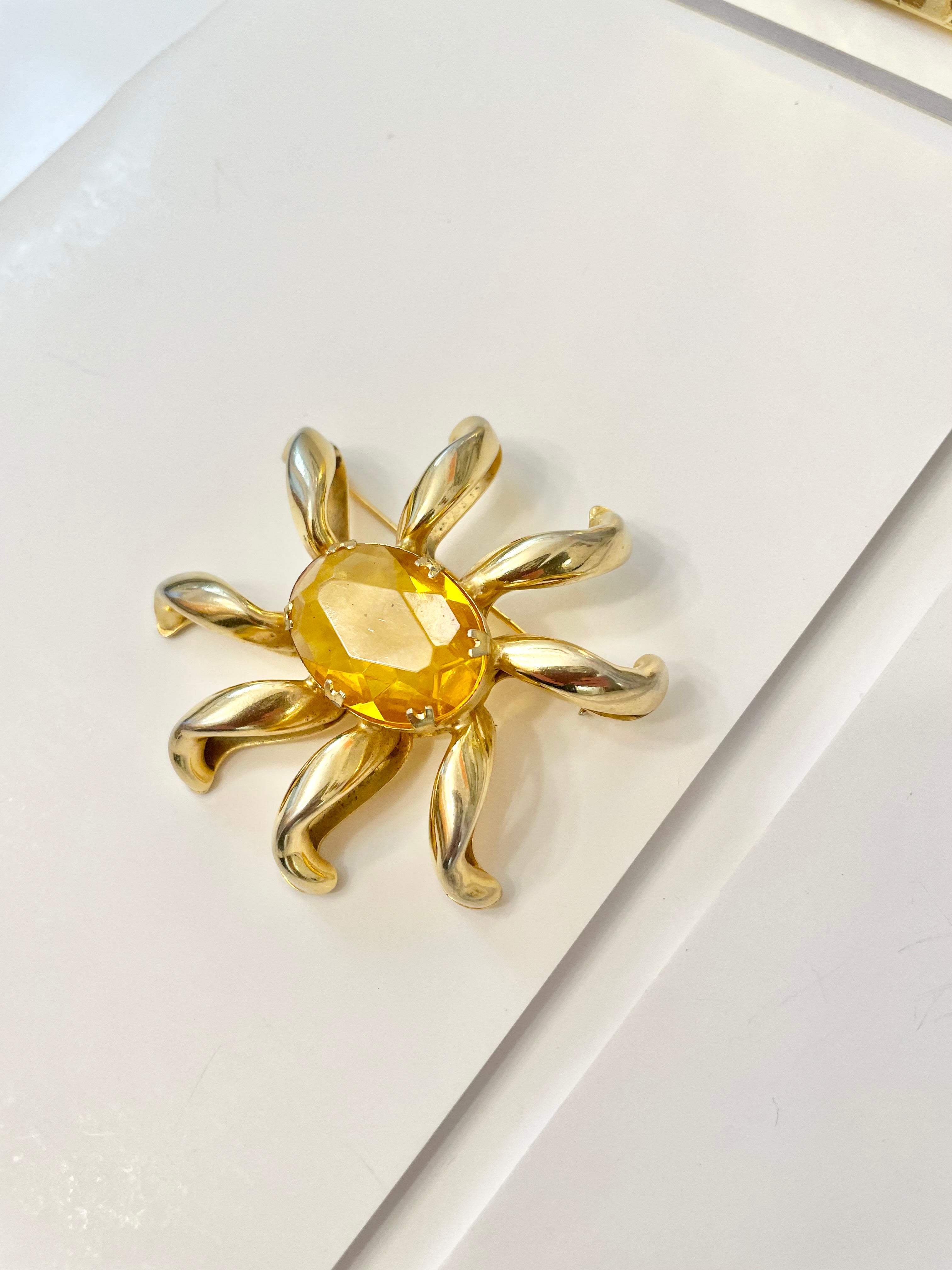 The most divine citrine glass, starburst gold classy brooch...