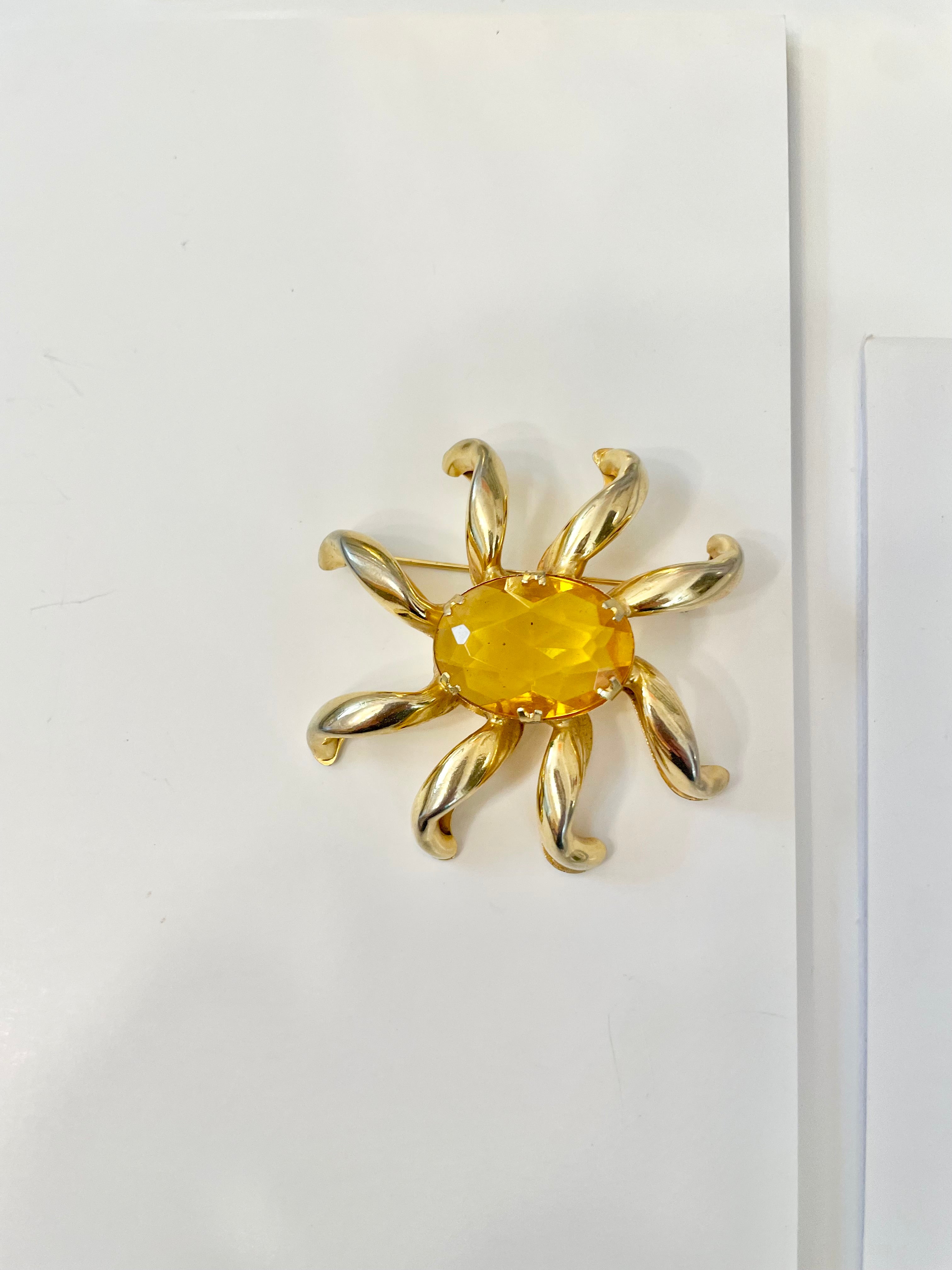 The most divine citrine glass, starburst gold classy brooch...