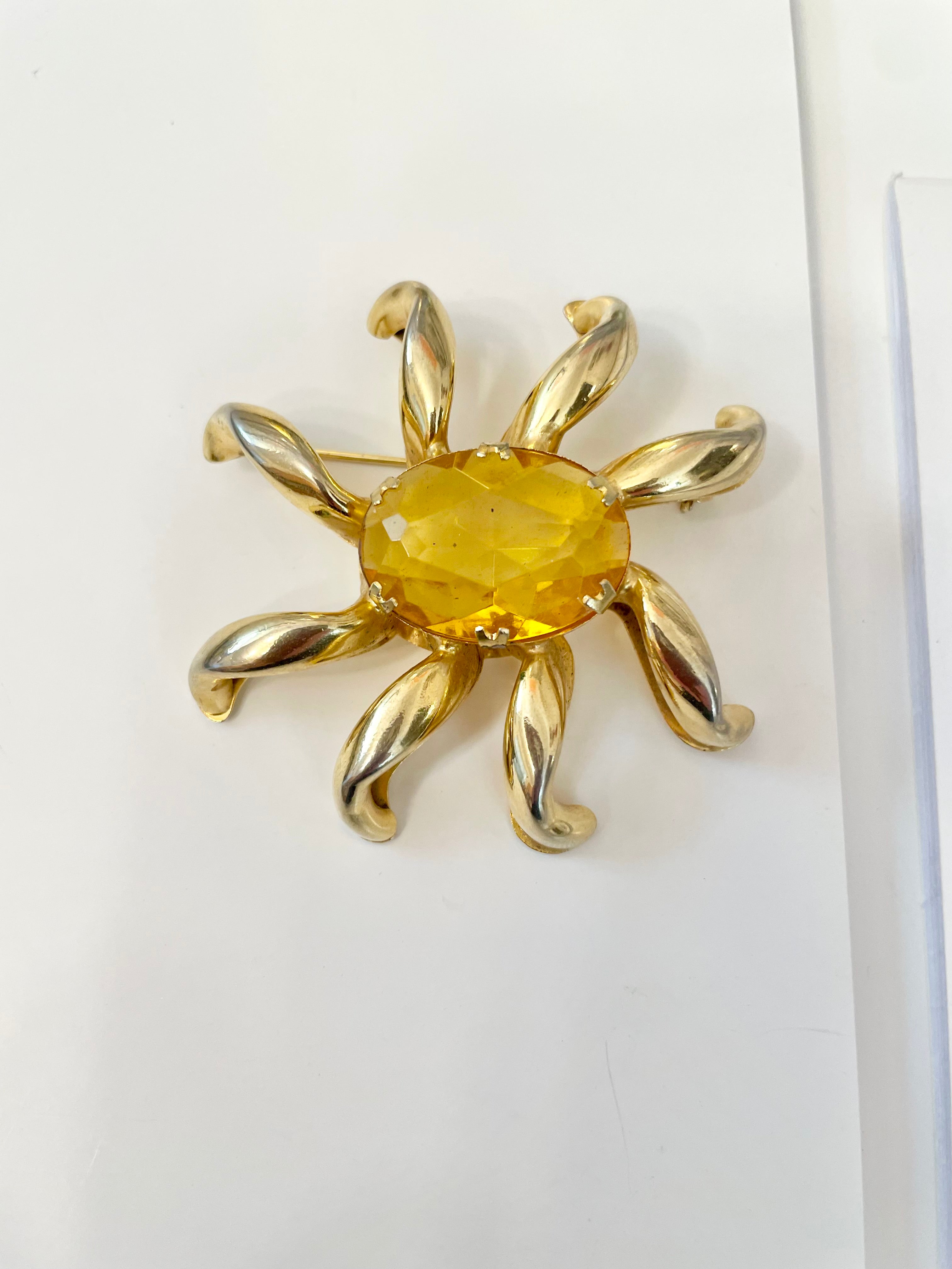 The most divine citrine glass, starburst gold classy brooch...