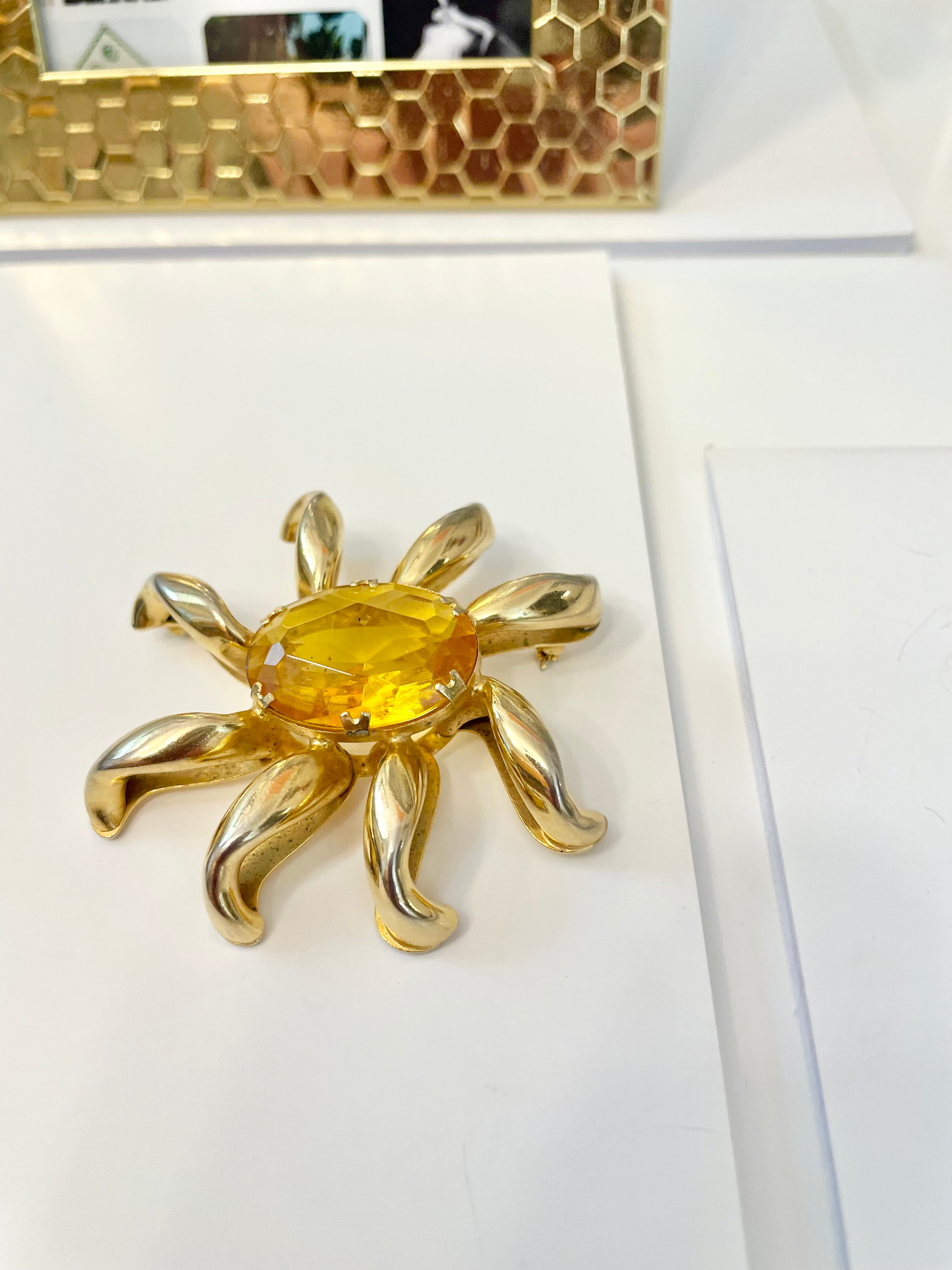 The most divine citrine glass, starburst gold classy brooch...