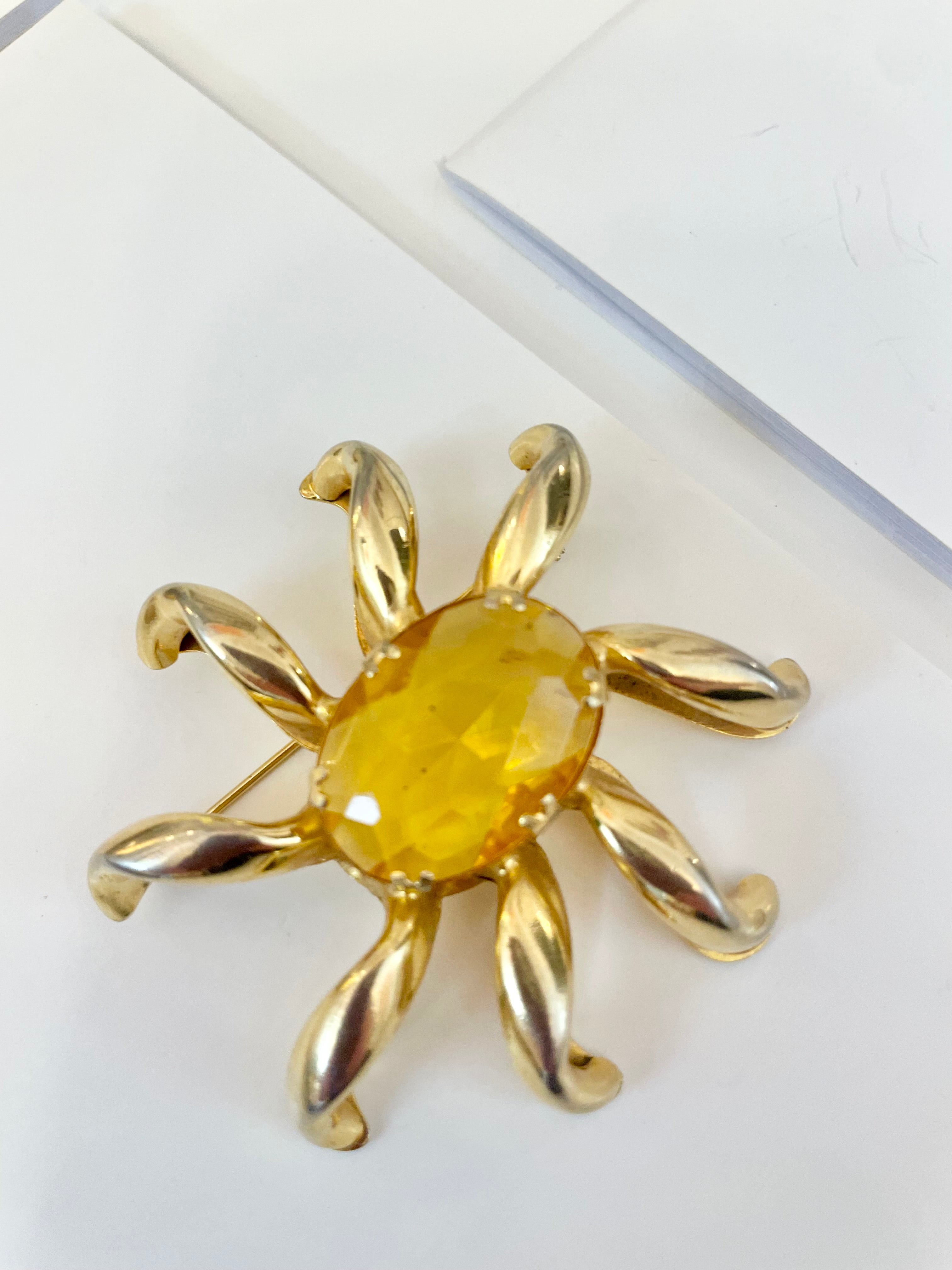 The most divine citrine glass, starburst gold classy brooch...