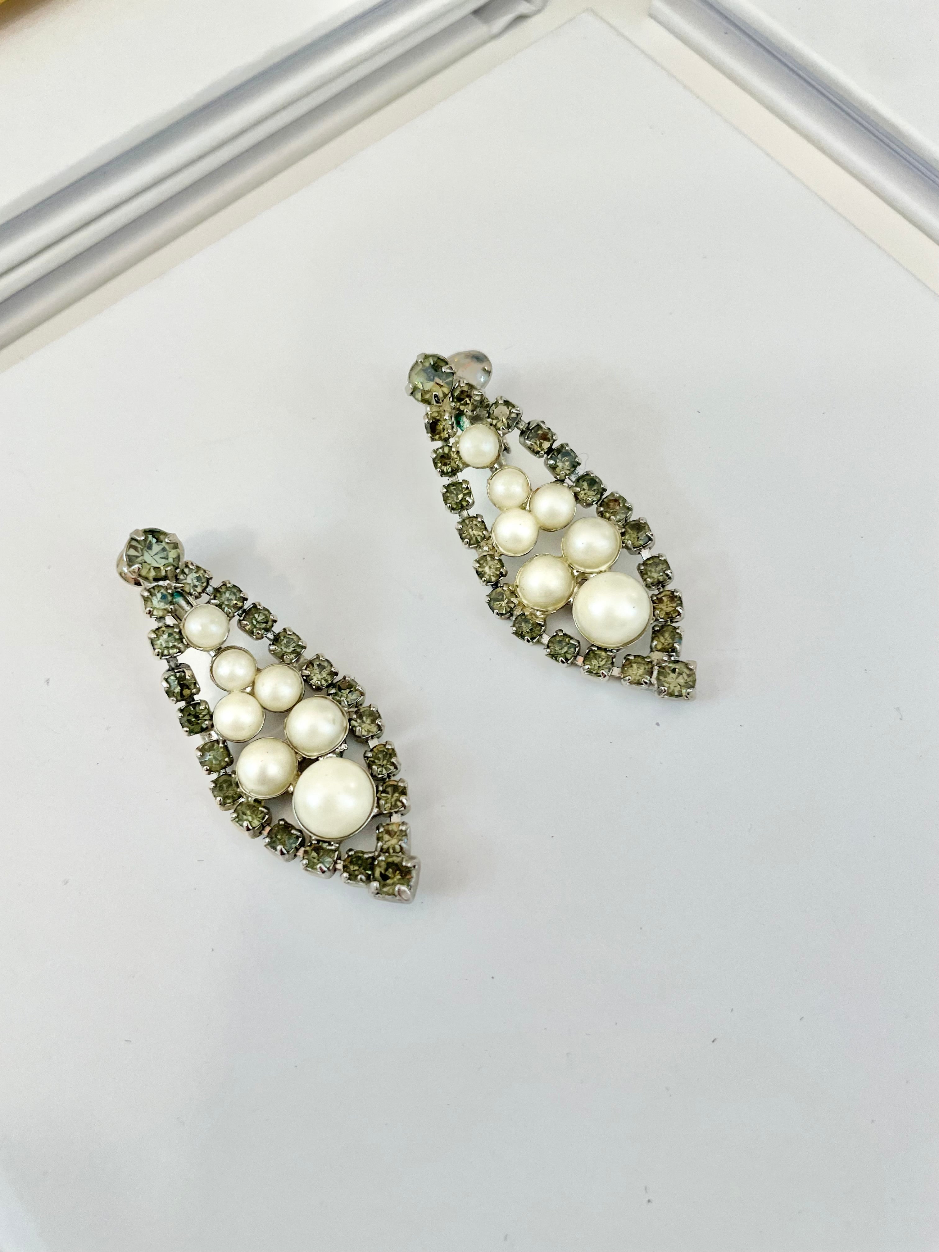 Isn't she charming... the lady loves a pearl drop earring like these! so elegant