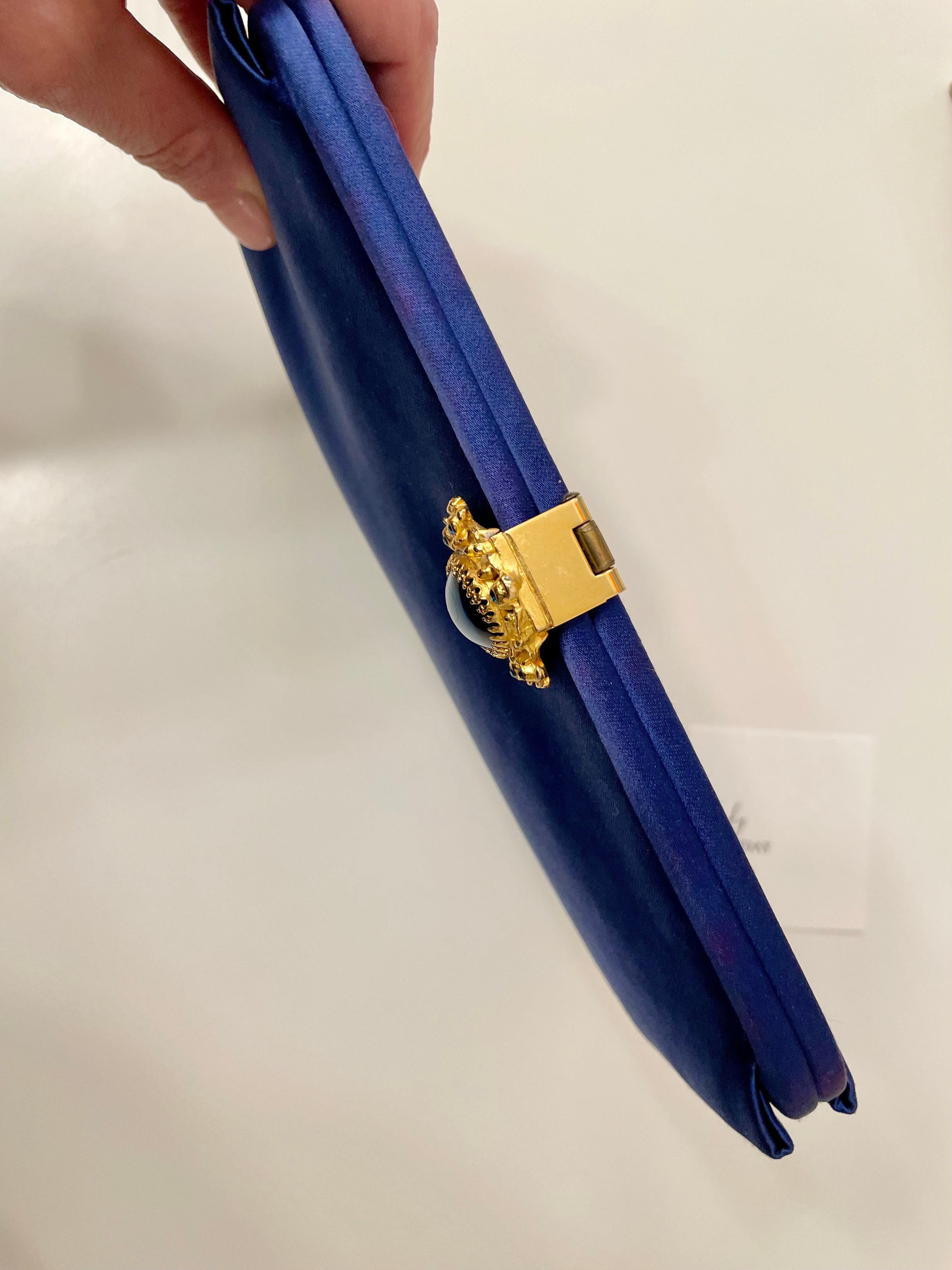 Glamorous and chic, 1960's vintage rich royal blue satin clutch bag, with stunning closure...so elegant