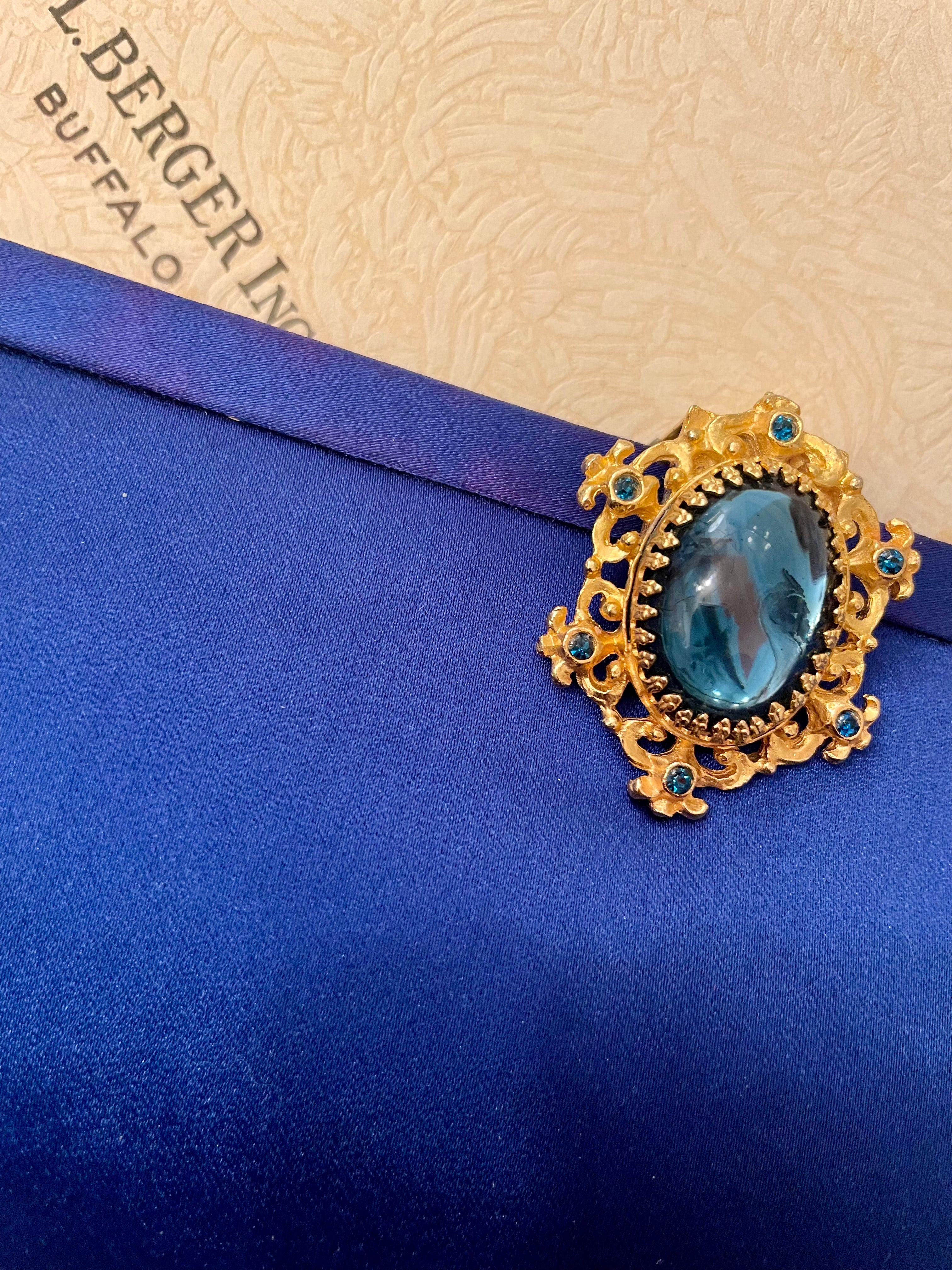 Glamorous and chic, 1960's vintage rich royal blue satin clutch bag, with stunning closure...so elegant