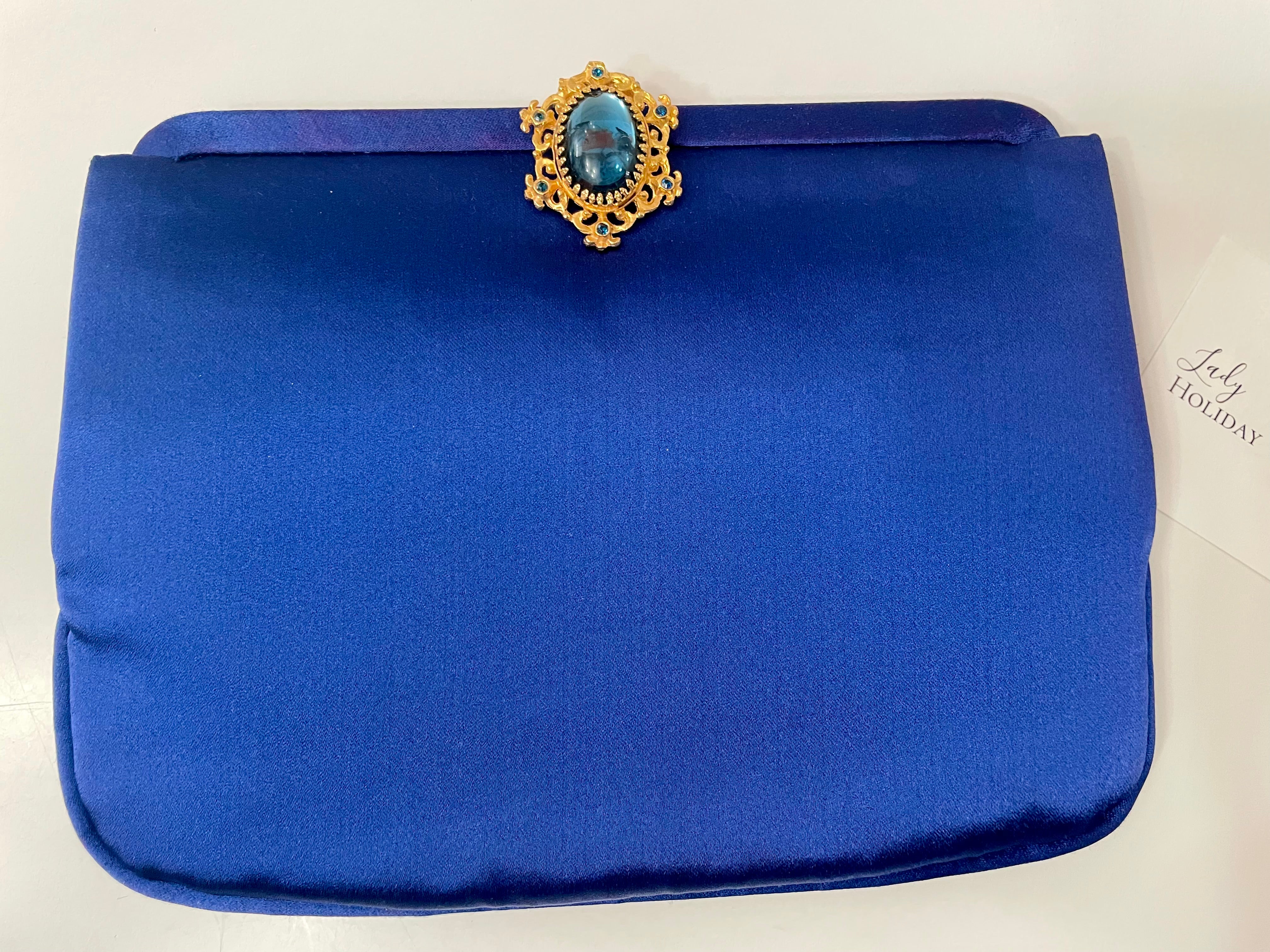 Glamorous and chic, 1960's vintage rich royal blue satin clutch bag, with stunning closure...so elegant