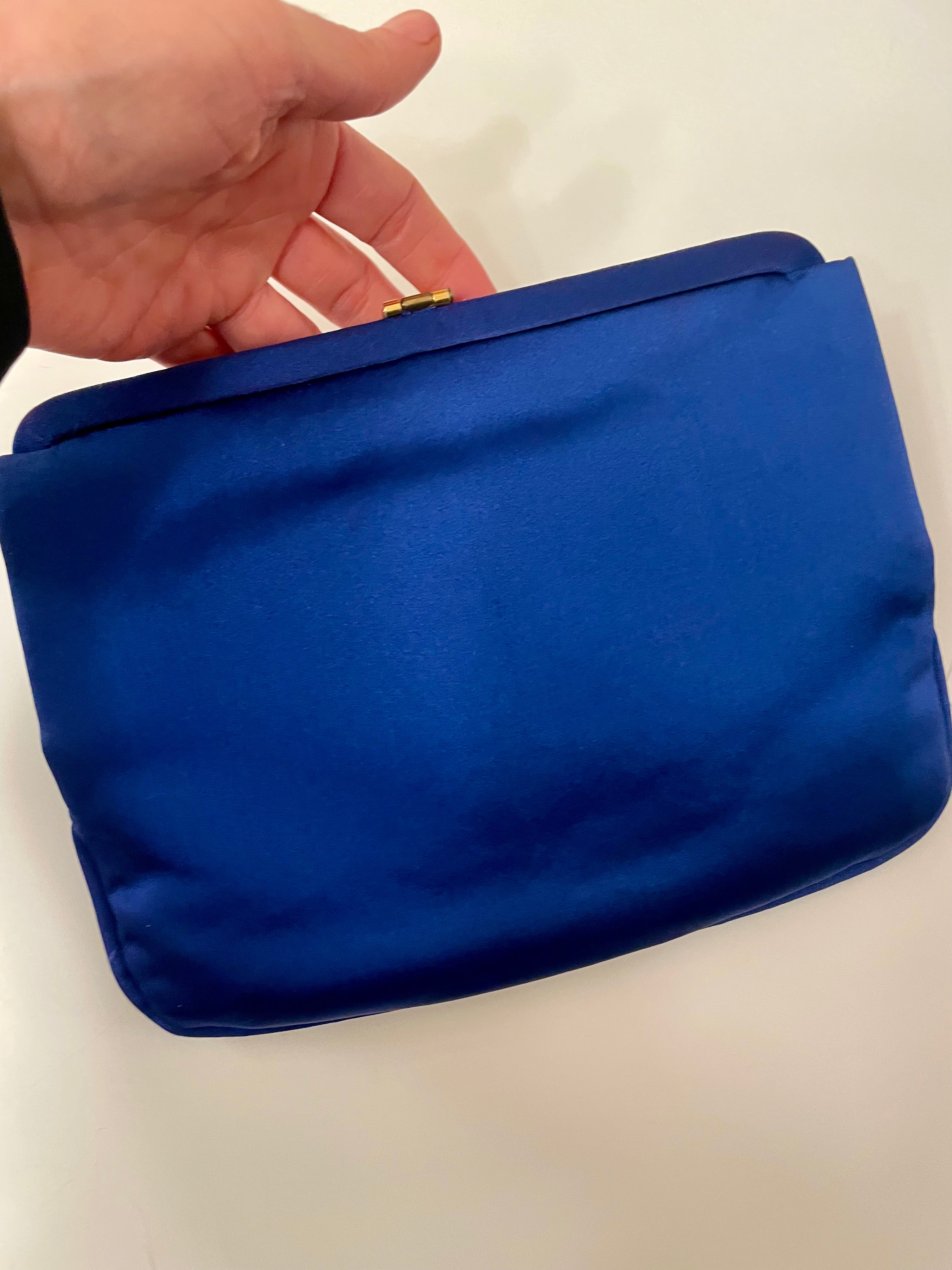 Glamorous and chic, 1960's vintage rich royal blue satin clutch bag, with stunning closure...so elegant