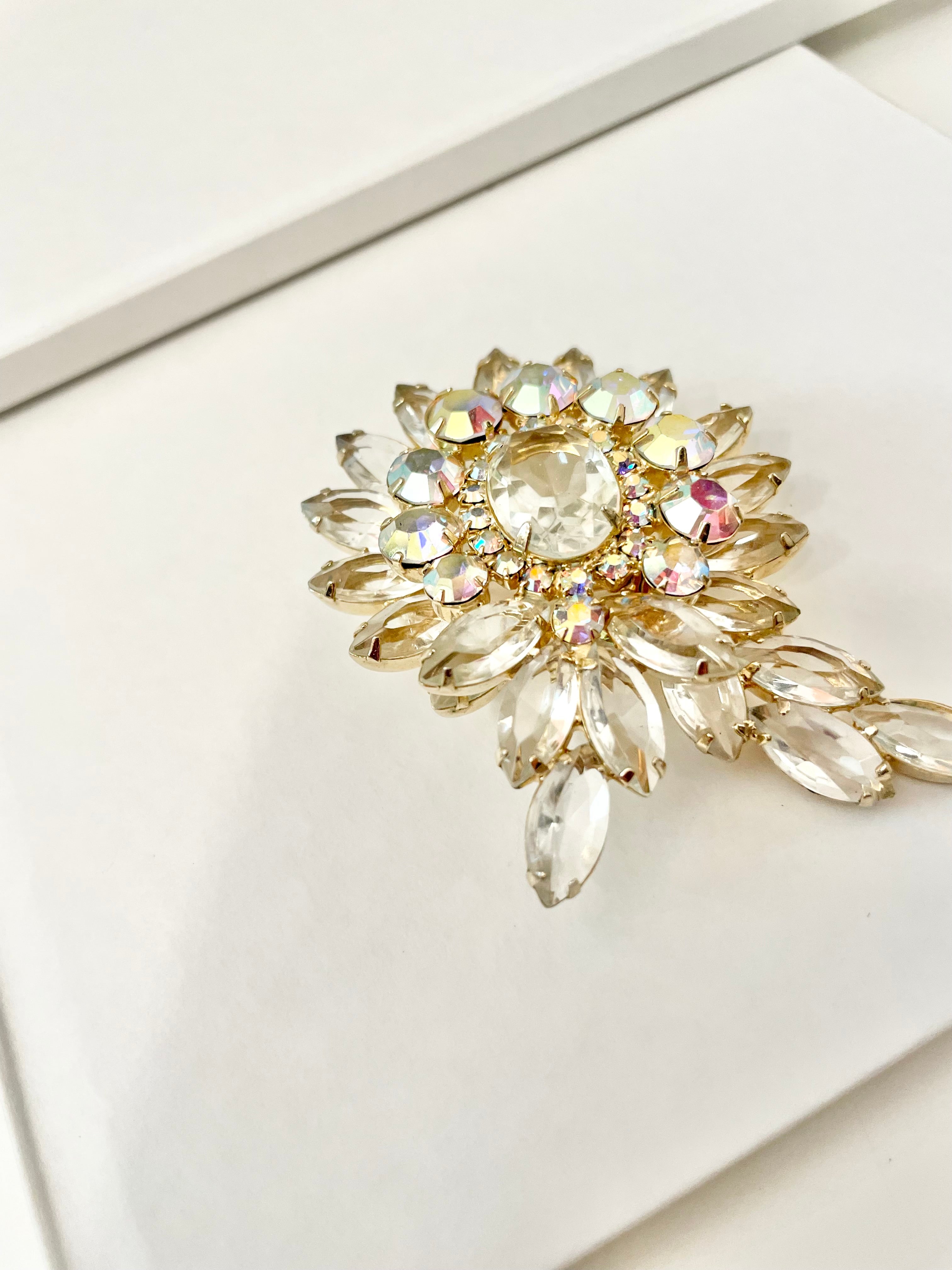 1960's Heiress, and her divine collection of crystal brooches! This one is to die for!