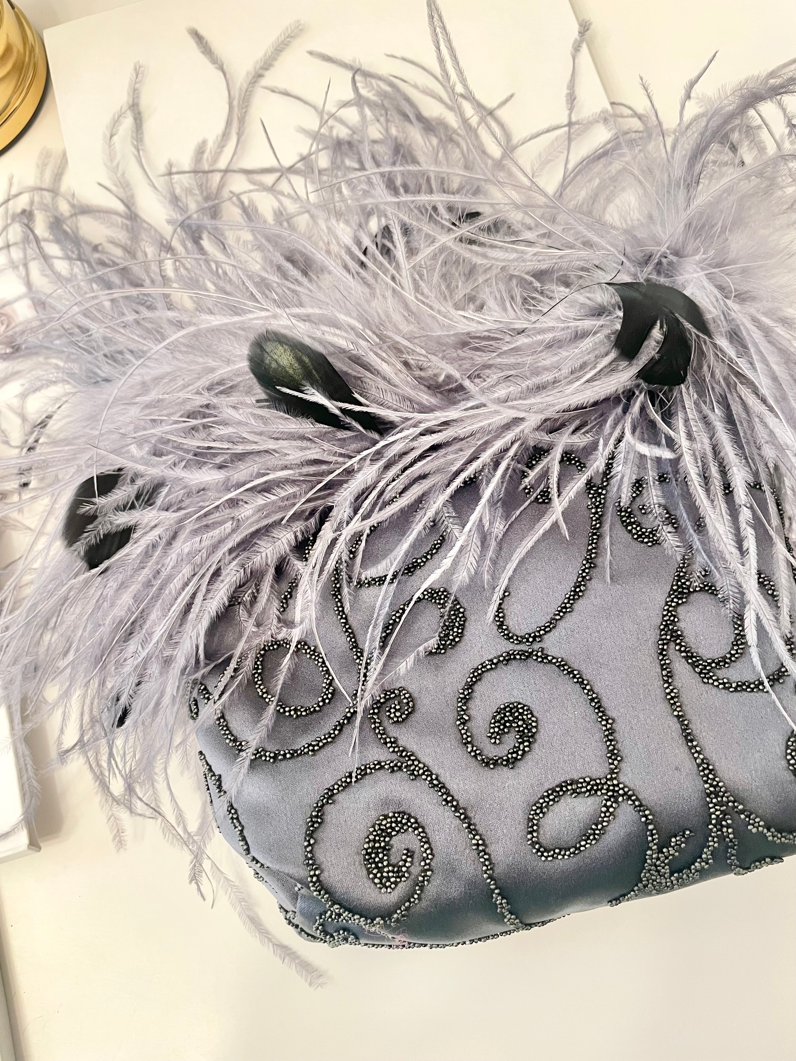 The Cheeky Mistress loves a grand entrance.. When she's wearing her ostrich feather bag, everyones's looking!