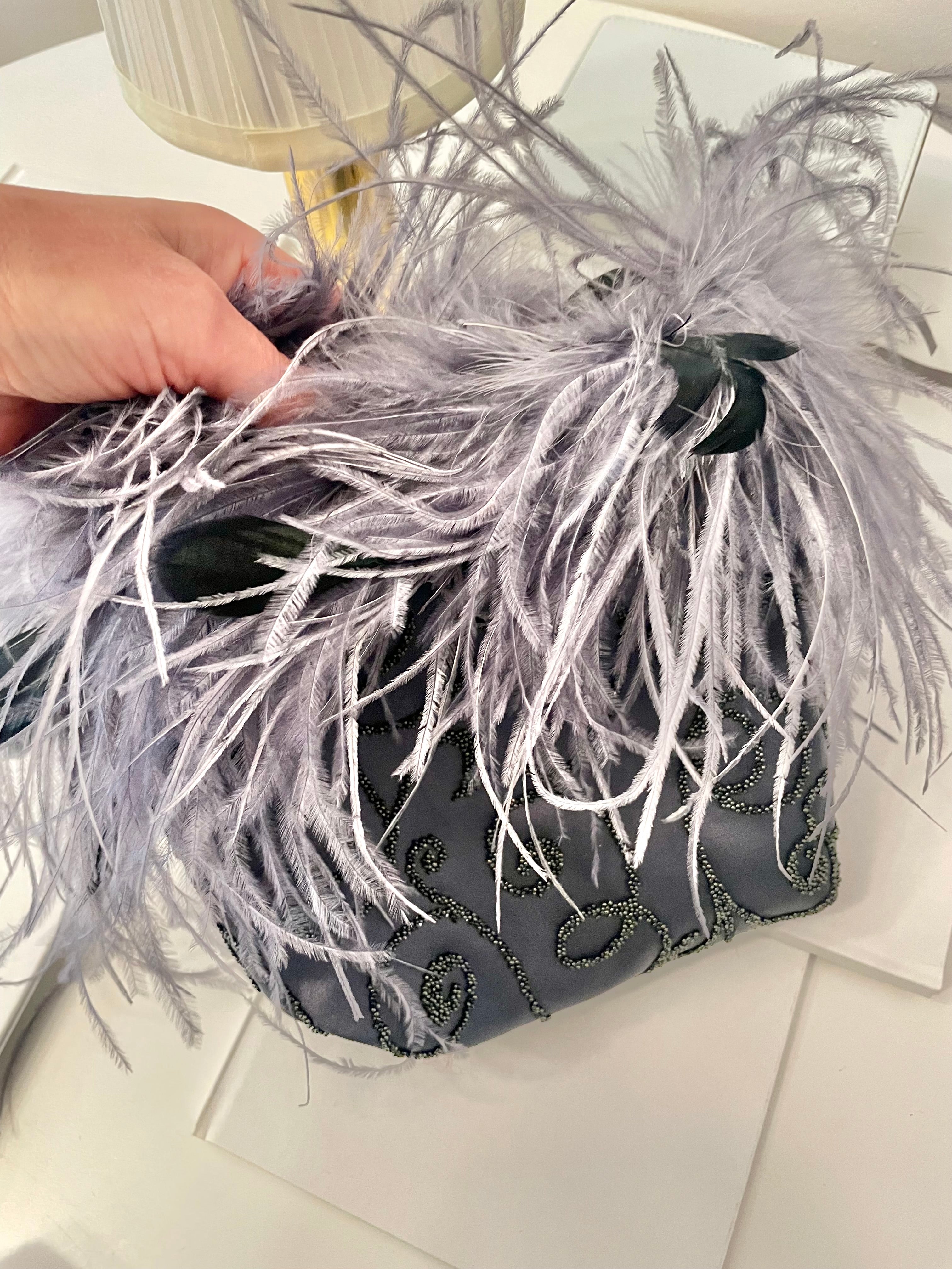 The Cheeky Mistress loves a grand entrance.. When she's wearing her ostrich feather bag, everyones's looking!