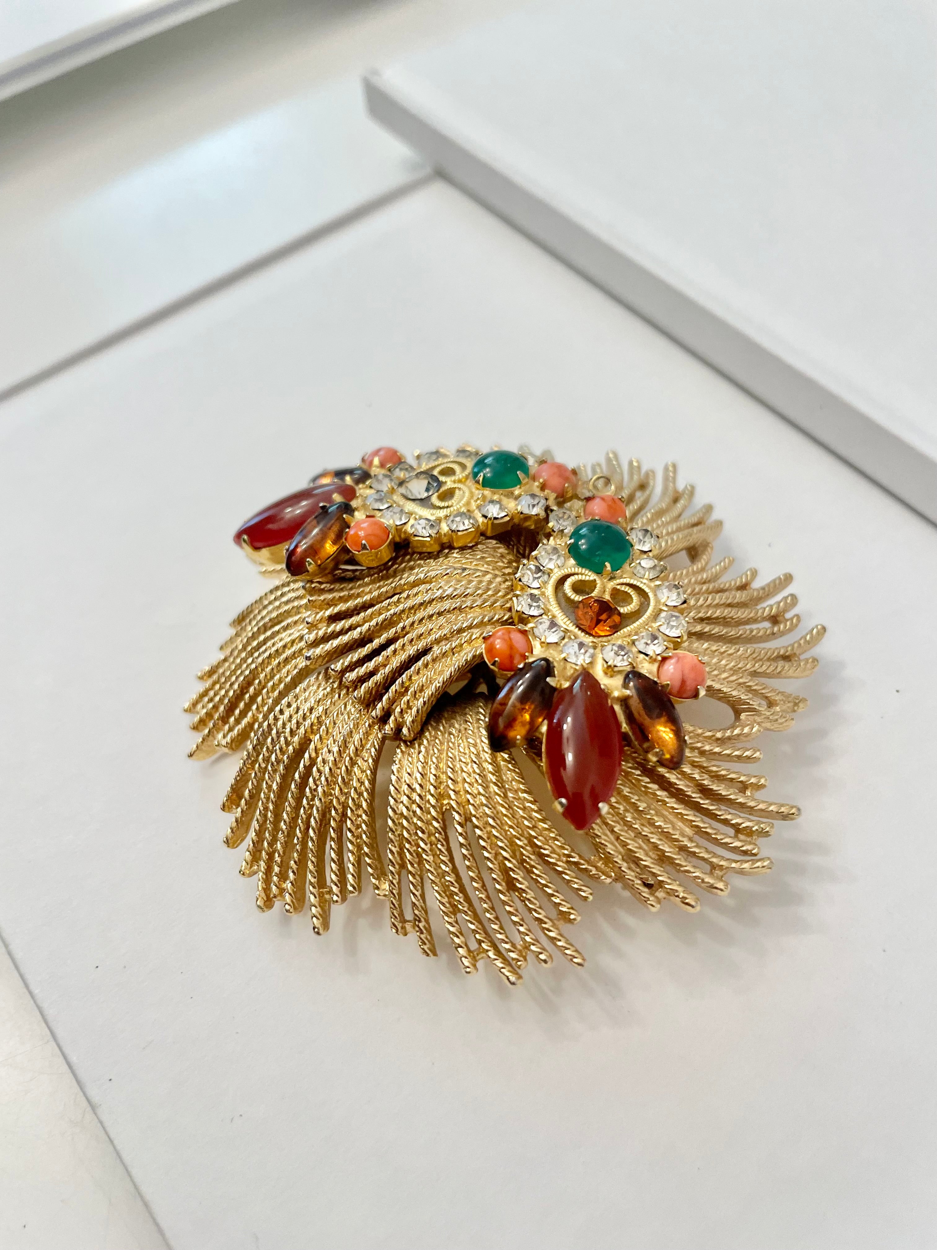 A beautiful rich gold brooch, adorned with the most exquisite color story, coral, green, and carnelian! so chic