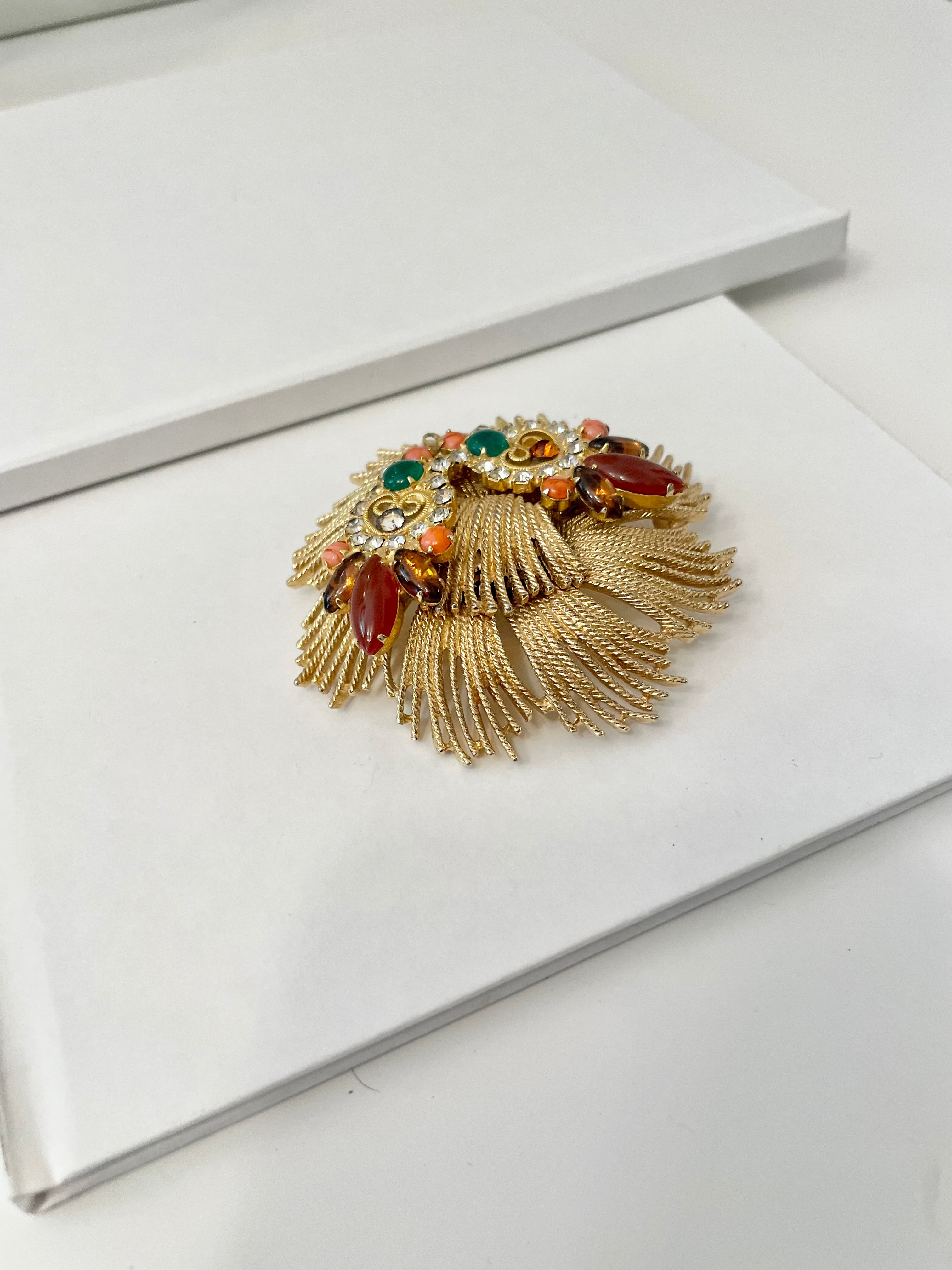 A beautiful rich gold brooch, adorned with the most exquisite color story, coral, green, and carnelian! so chic