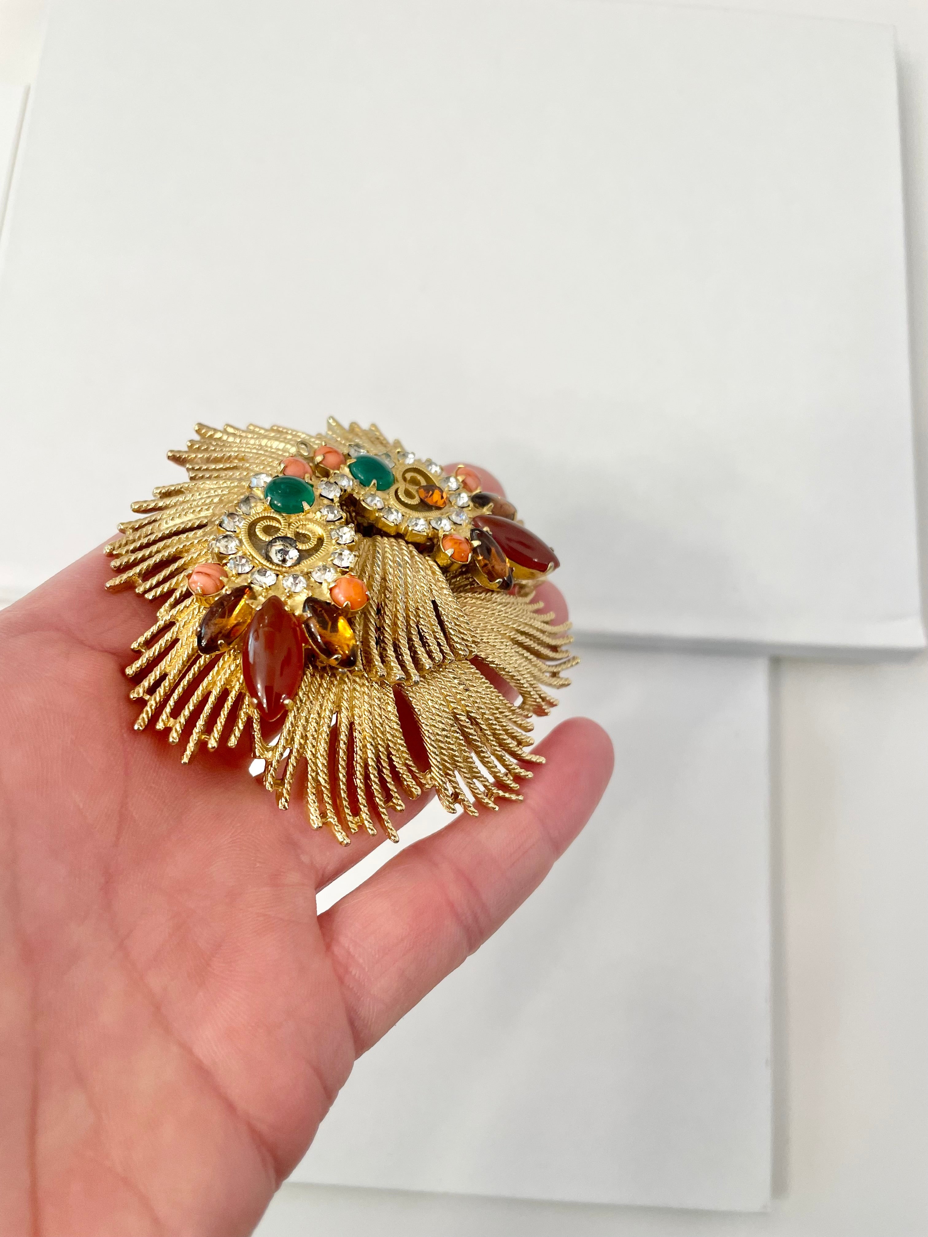 A beautiful rich gold brooch, adorned with the most exquisite color story, coral, green, and carnelian! so chic