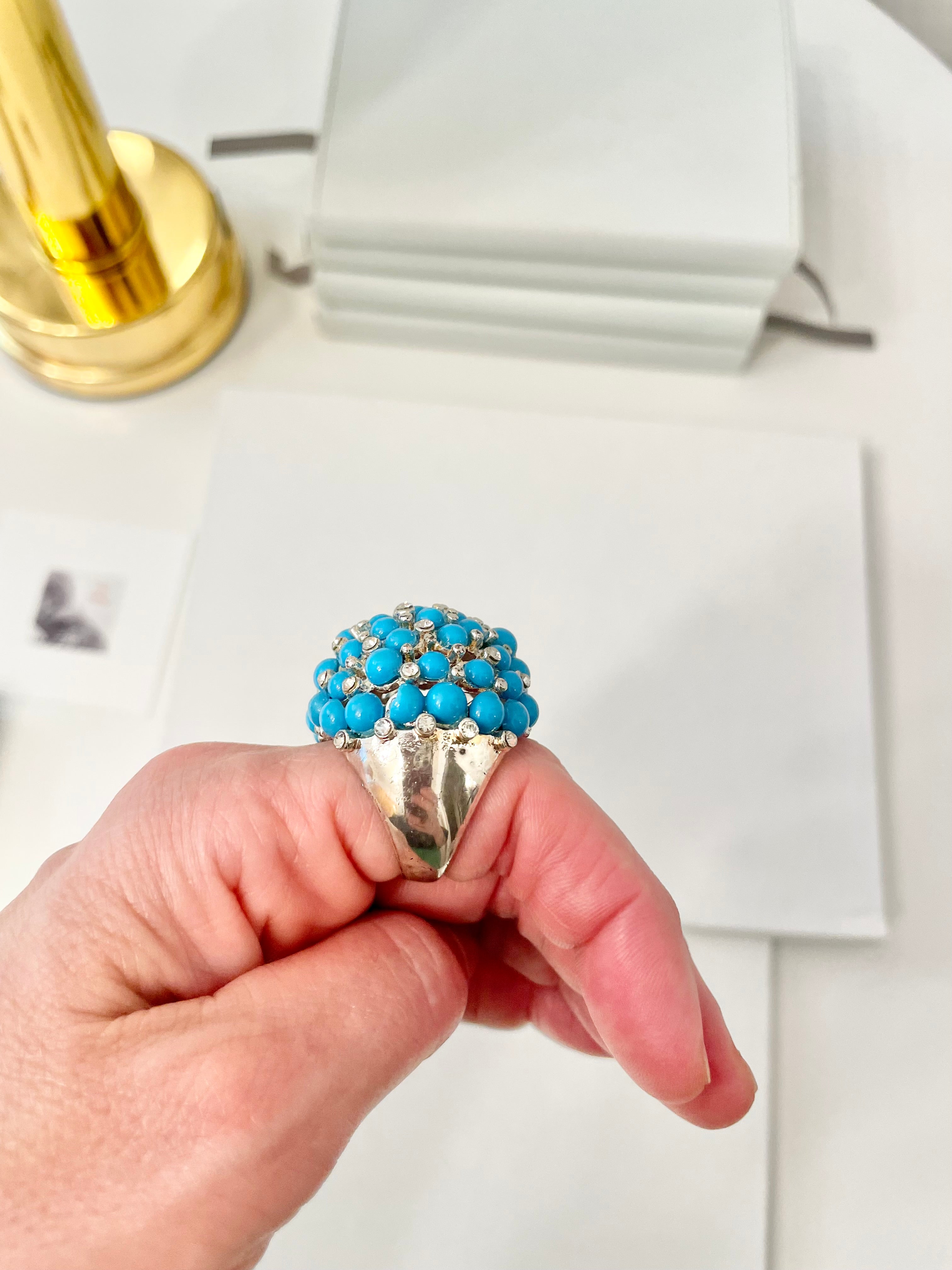 The Happy Hostess and her colorful life...this large faux turquoise cocktail ring is making all ladies gitty!