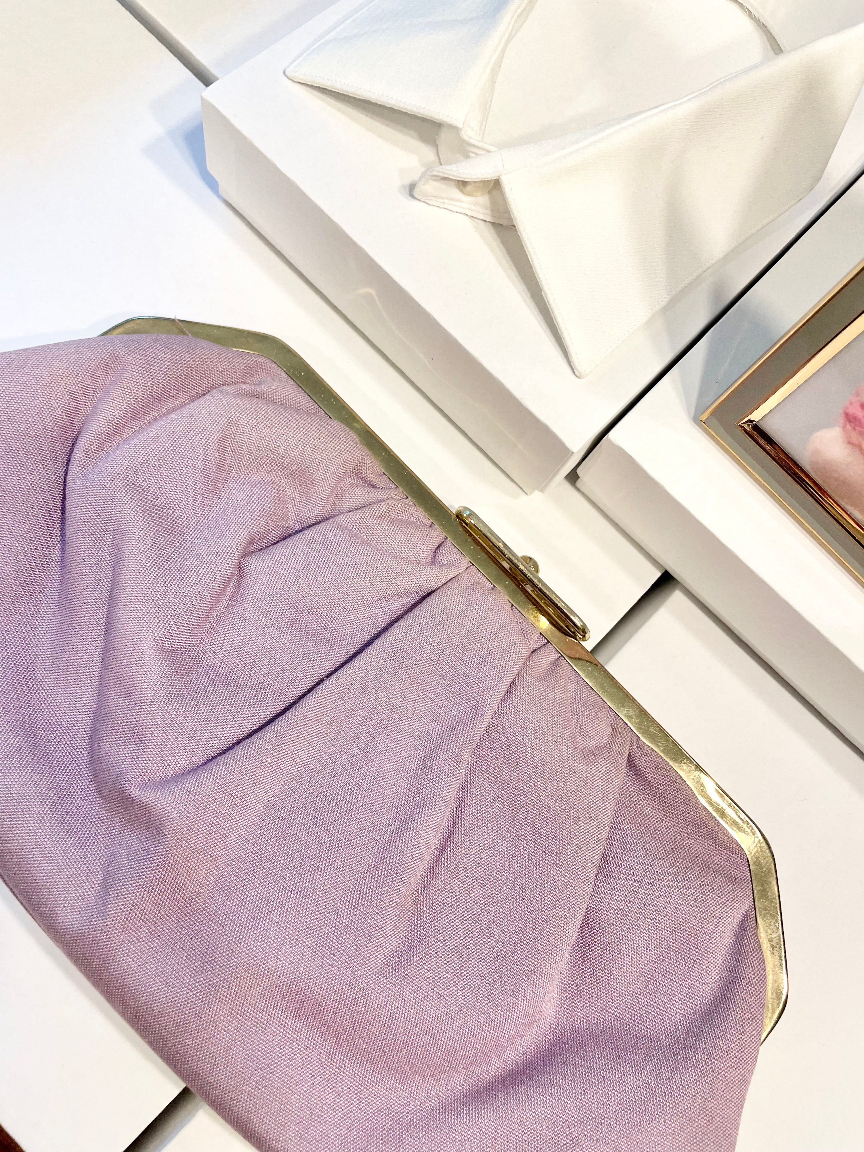 The Happy Hostess loves anything colorful! She does this feminine lilac linen colored clutch bag... so snazzy!
