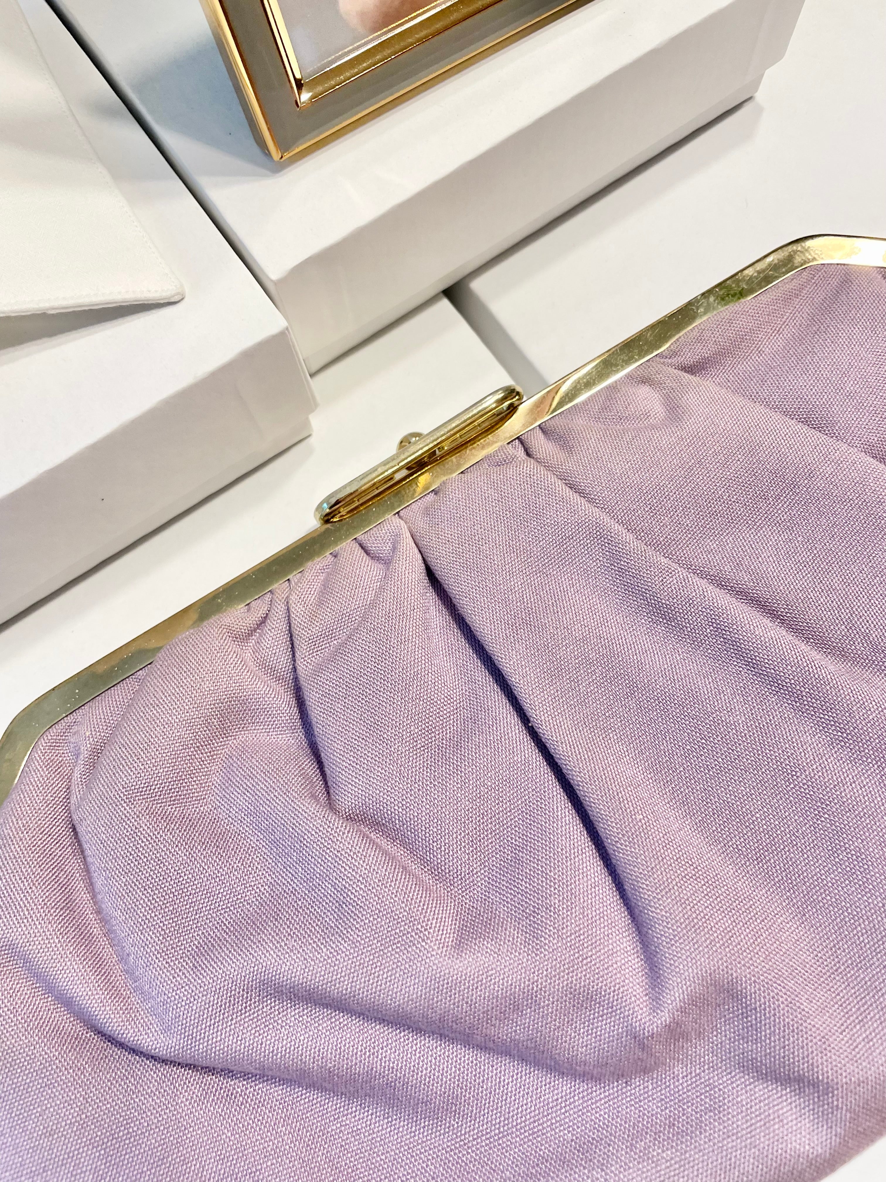 The Happy Hostess loves anything colorful! She does this feminine lilac linen colored clutch bag... so snazzy!