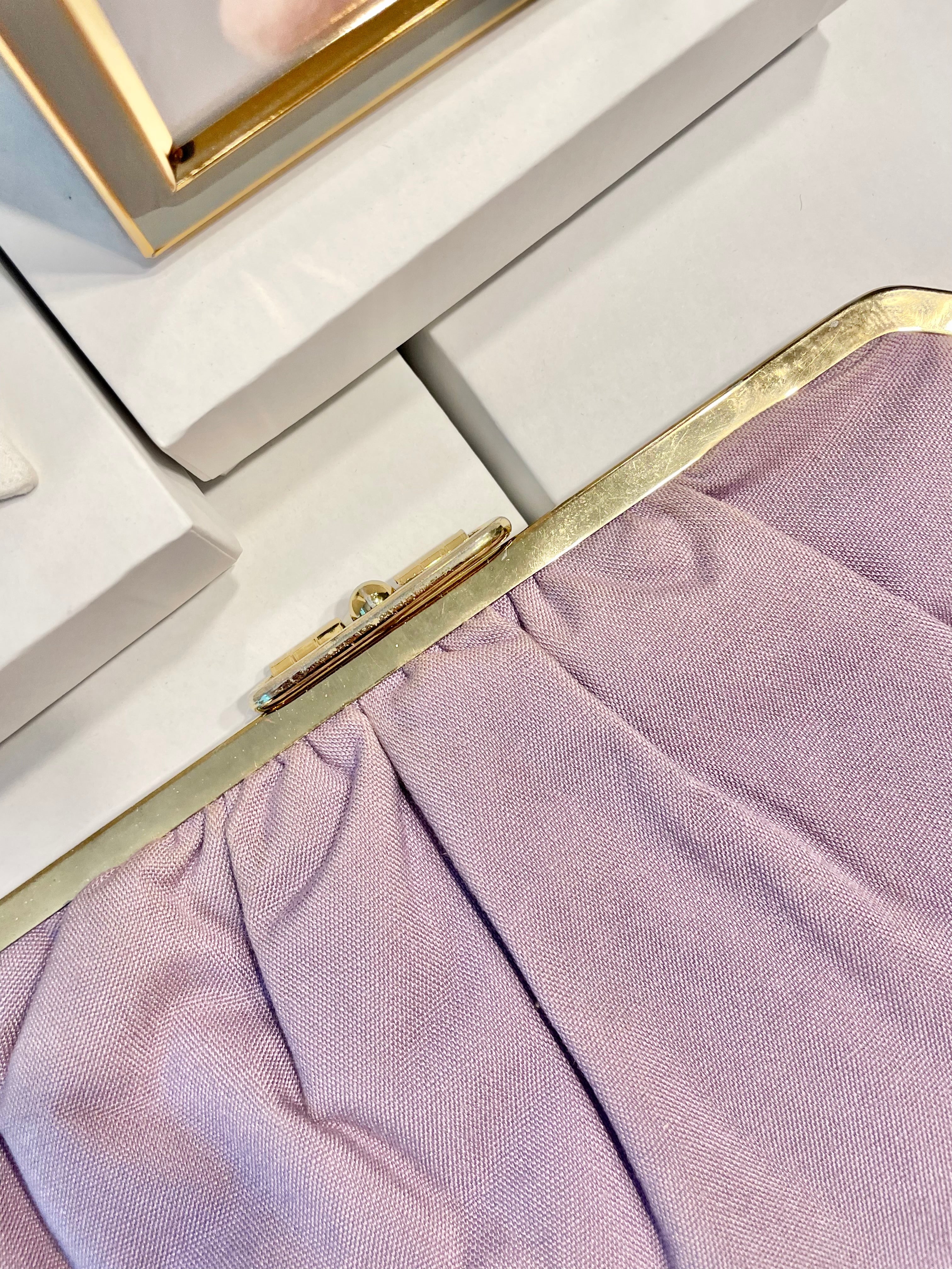 The Happy Hostess loves anything colorful! She does this feminine lilac linen colored clutch bag... so snazzy!