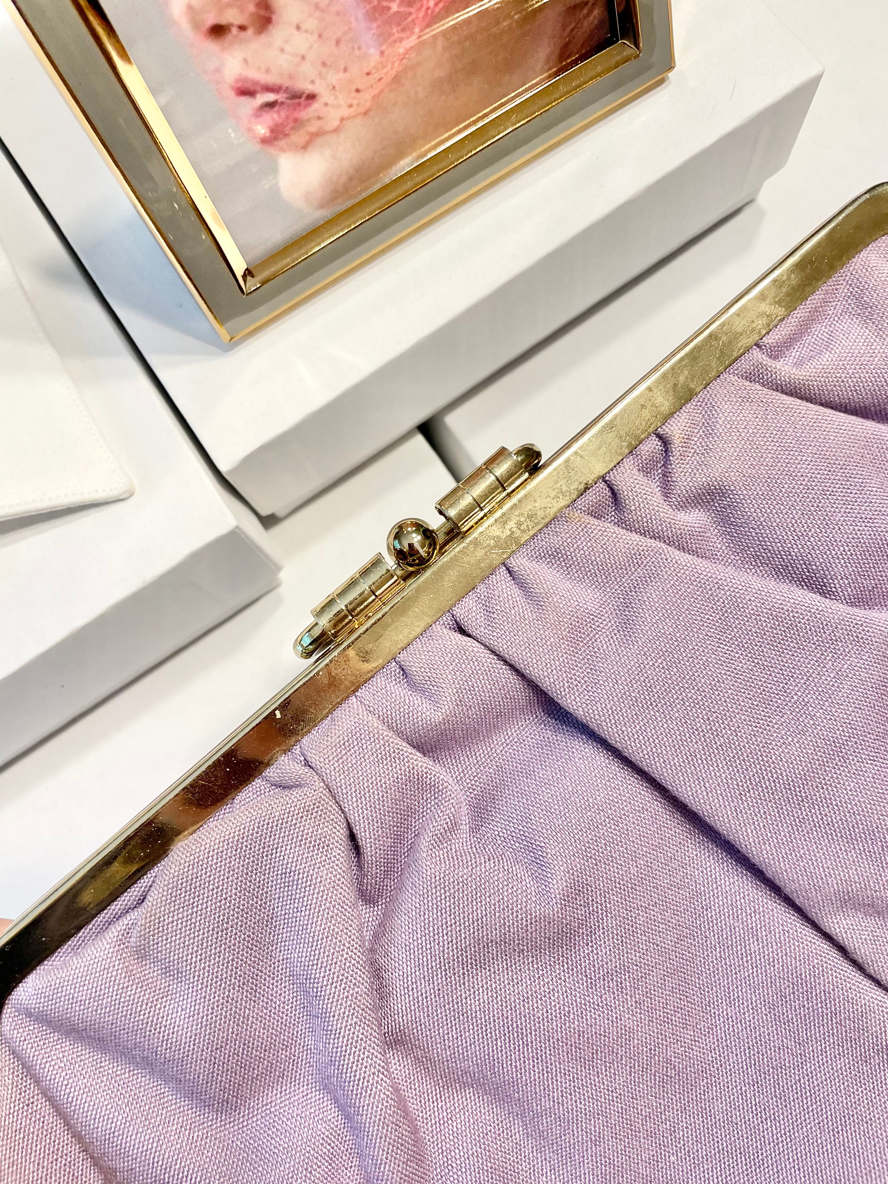 The Happy Hostess loves anything colorful! She does this feminine lilac linen colored clutch bag... so snazzy!