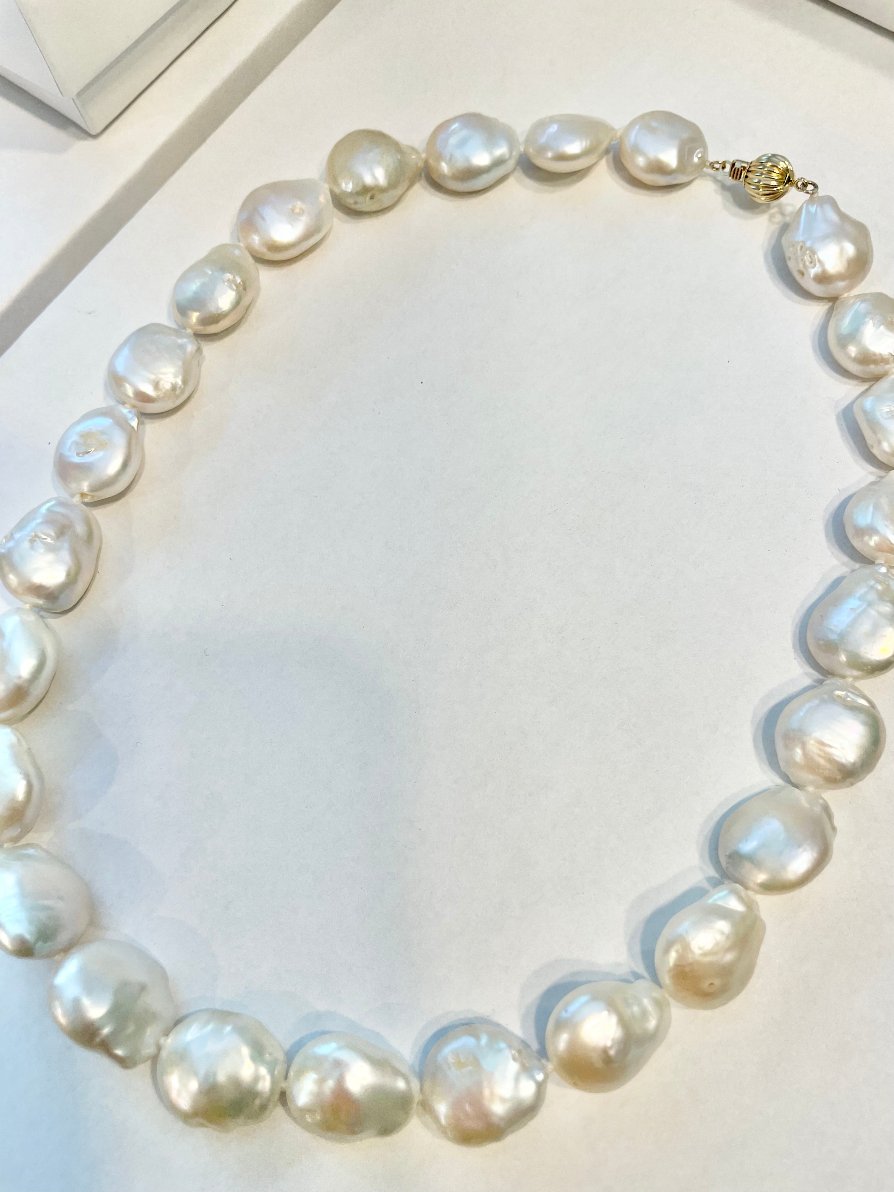 Isn't she Charming!!! This extraordinary genuine baroque fresh water pearls is a true classic for any lady to adore!