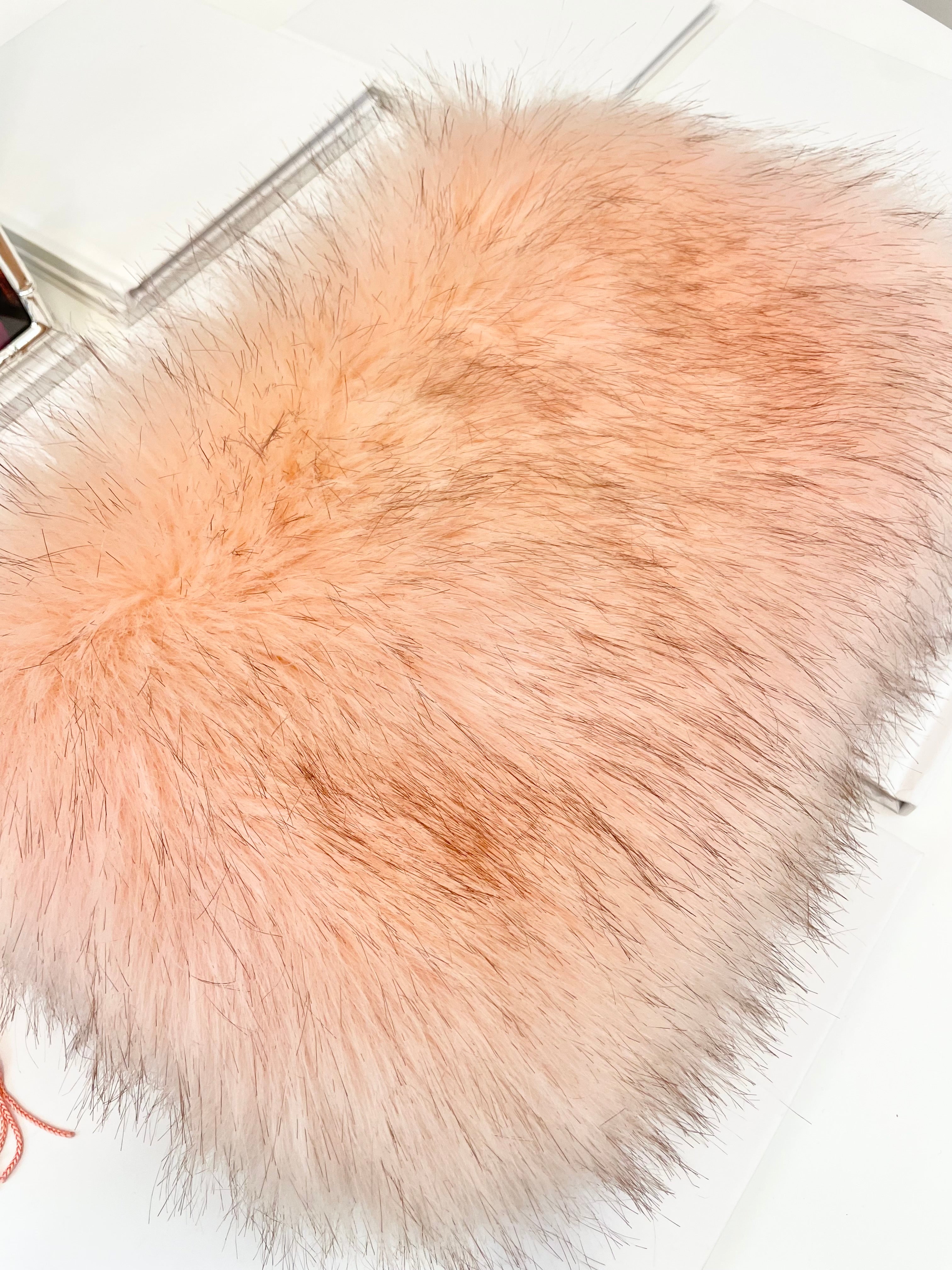The most lovely blush faux fur clutch bag! So feminine...