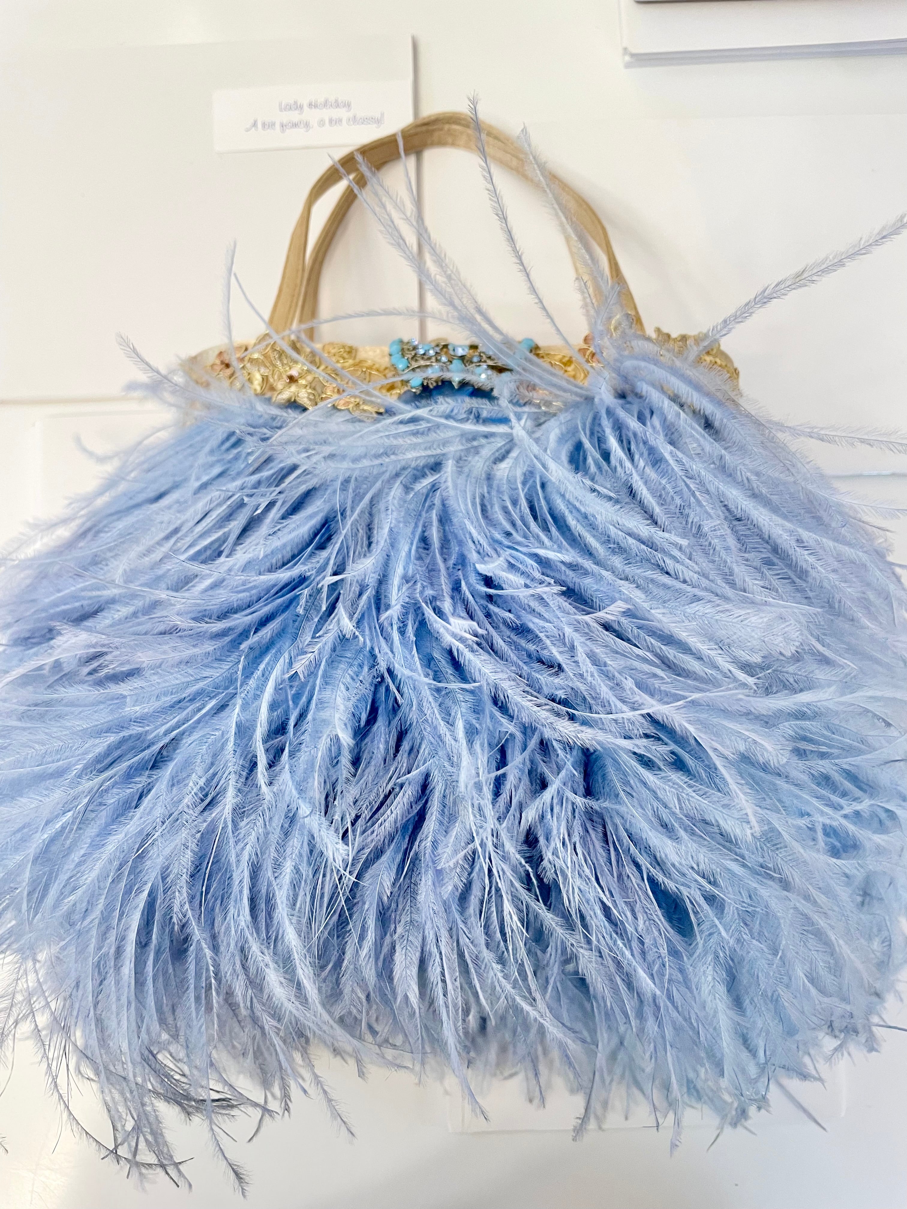 The Most extraordinary periwinkle blue, ostrich feather party bag.... so elgant