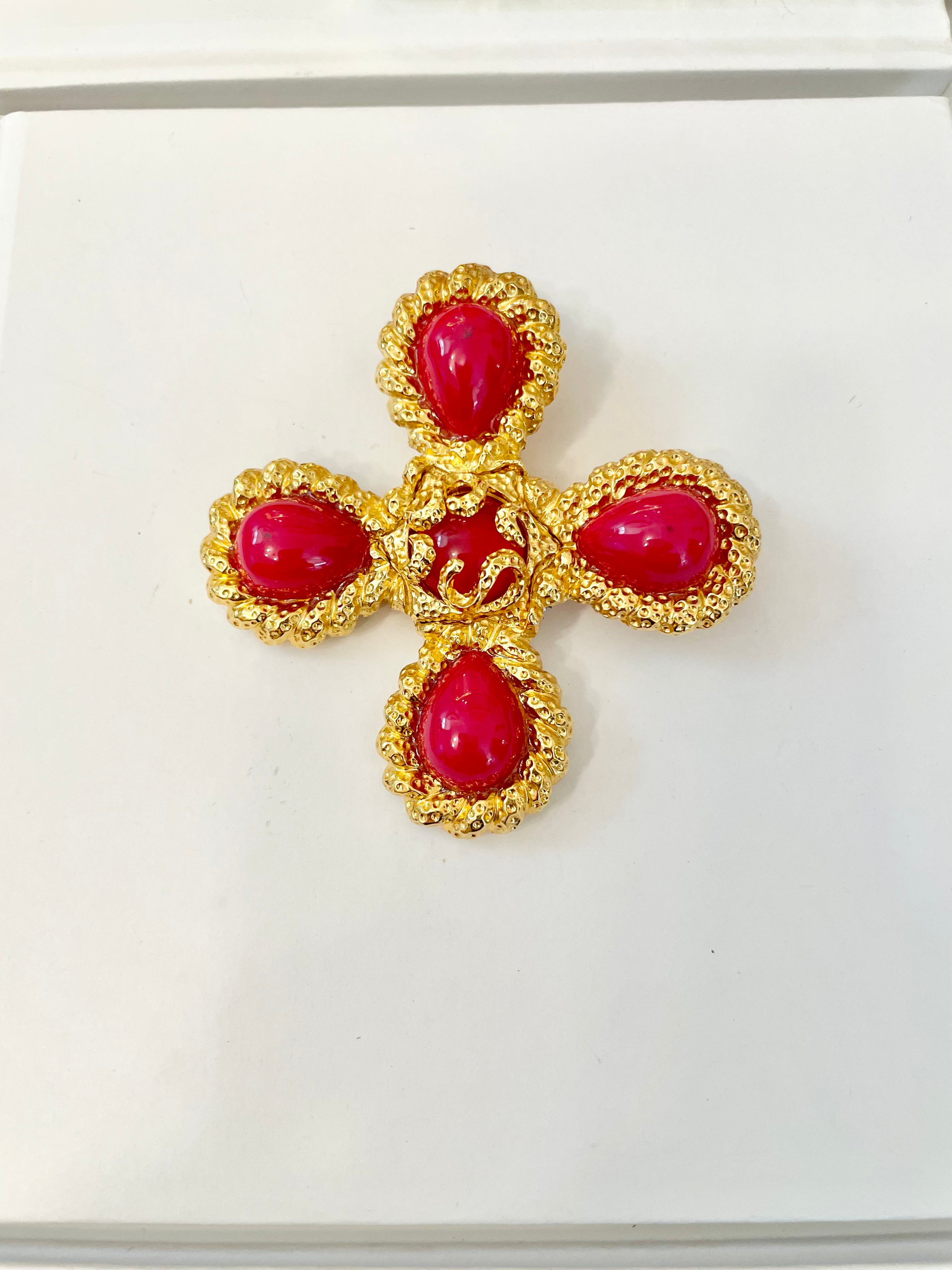 A truly classy St. John hot pink Maltese cross brooch.... so chic