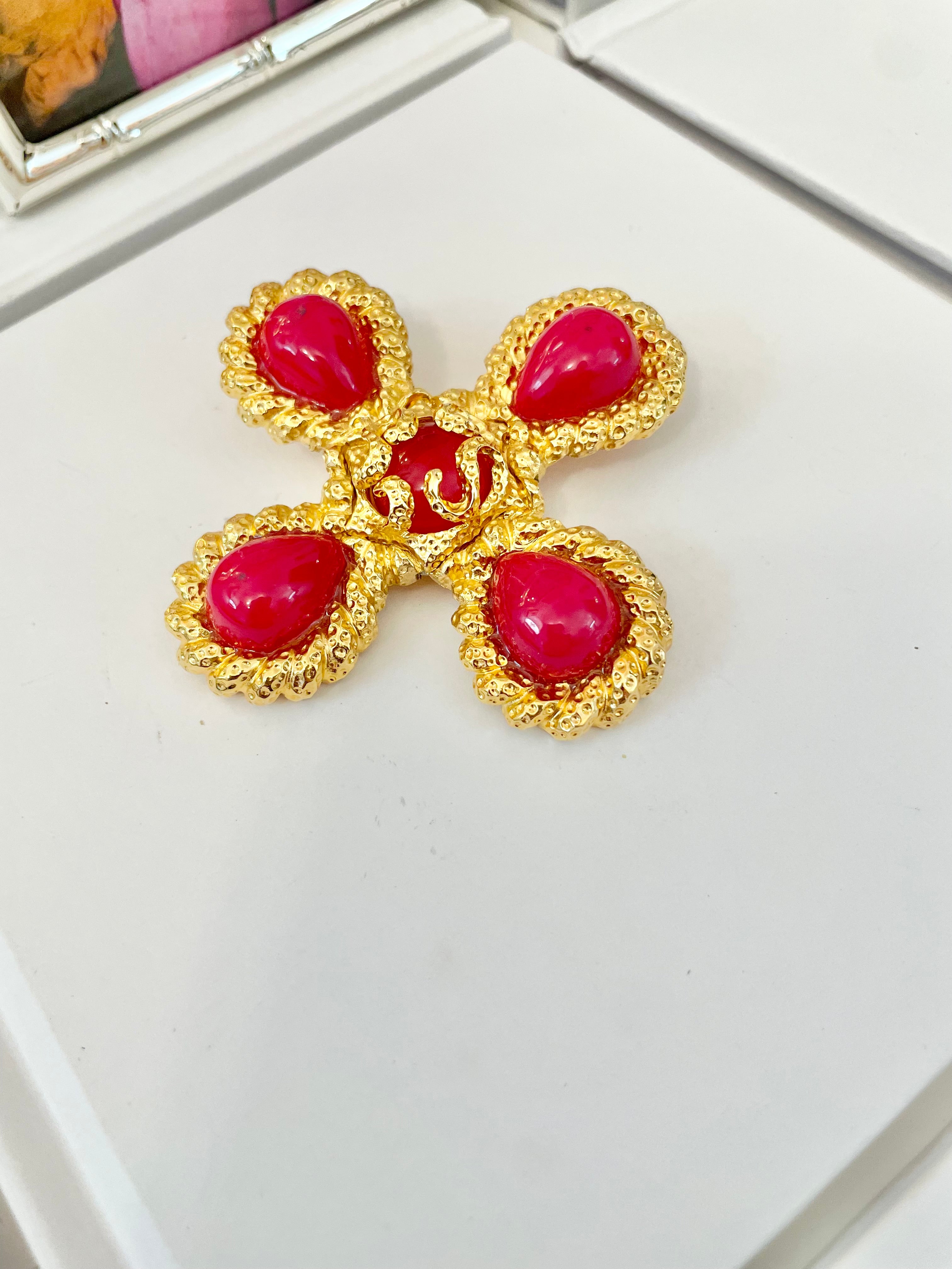 A truly classy St. John hot pink Maltese cross brooch.... so chic