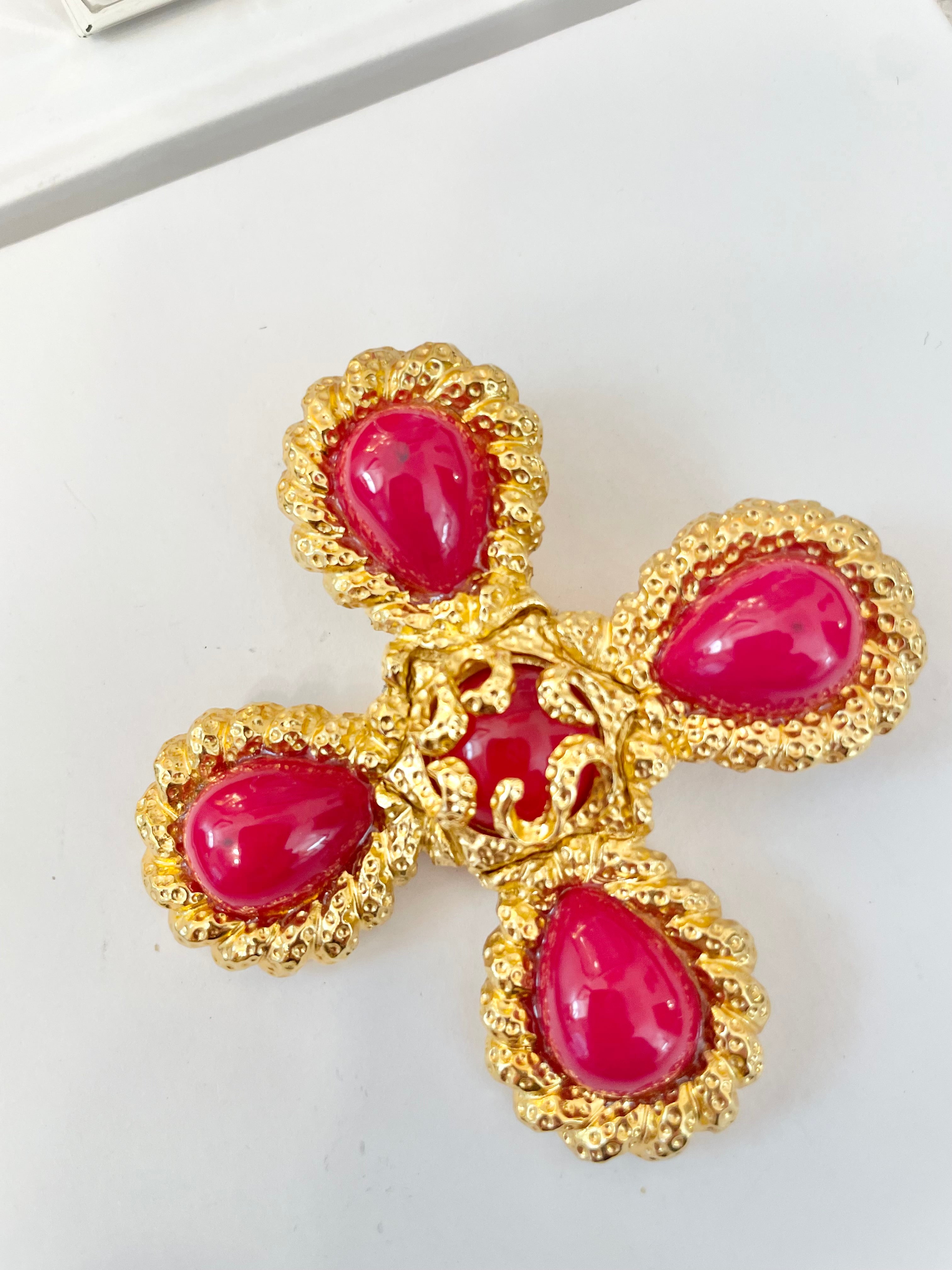 A truly classy St. John hot pink Maltese cross brooch.... so chic