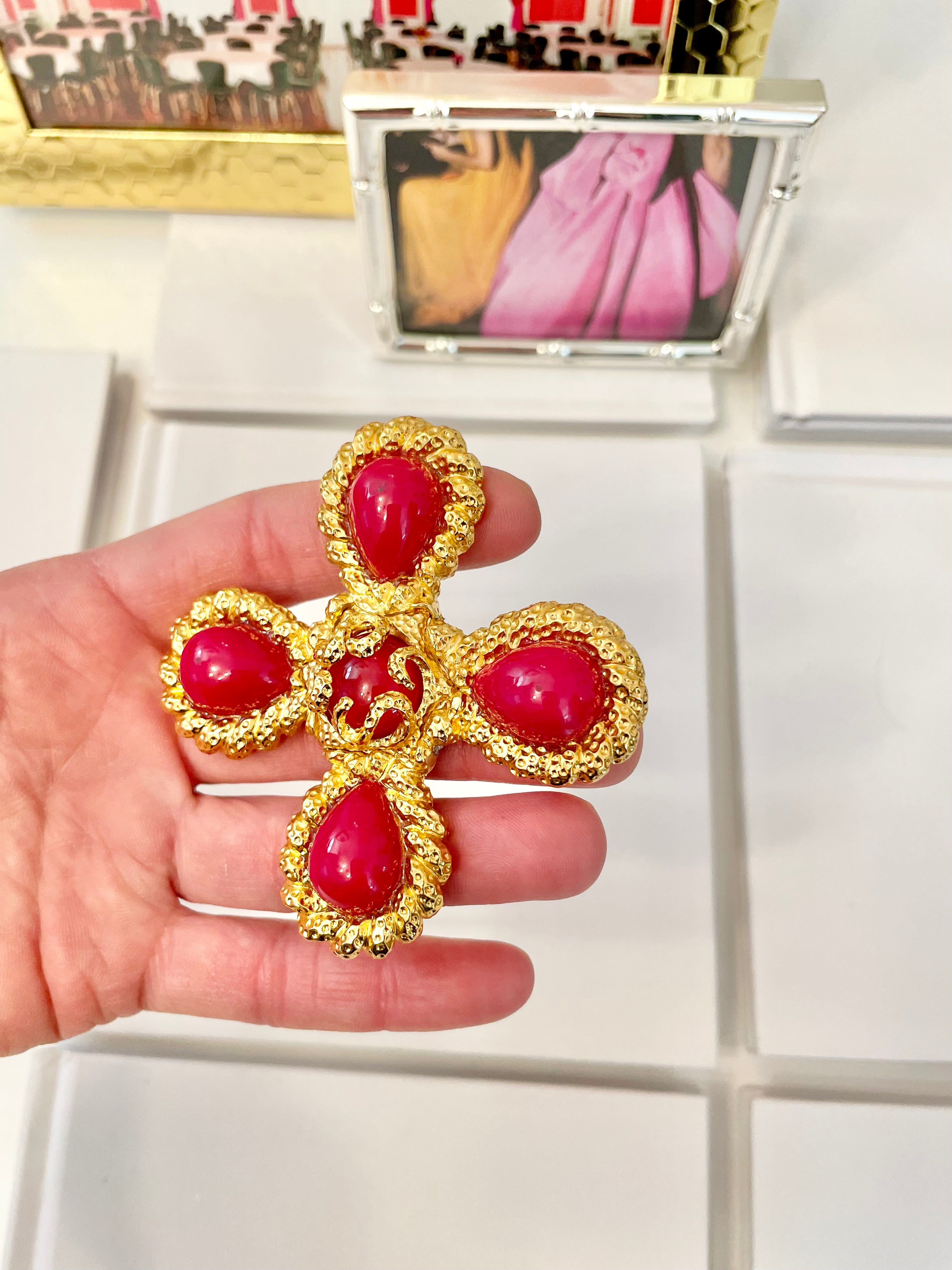 A truly classy St. John hot pink Maltese cross brooch.... so chic