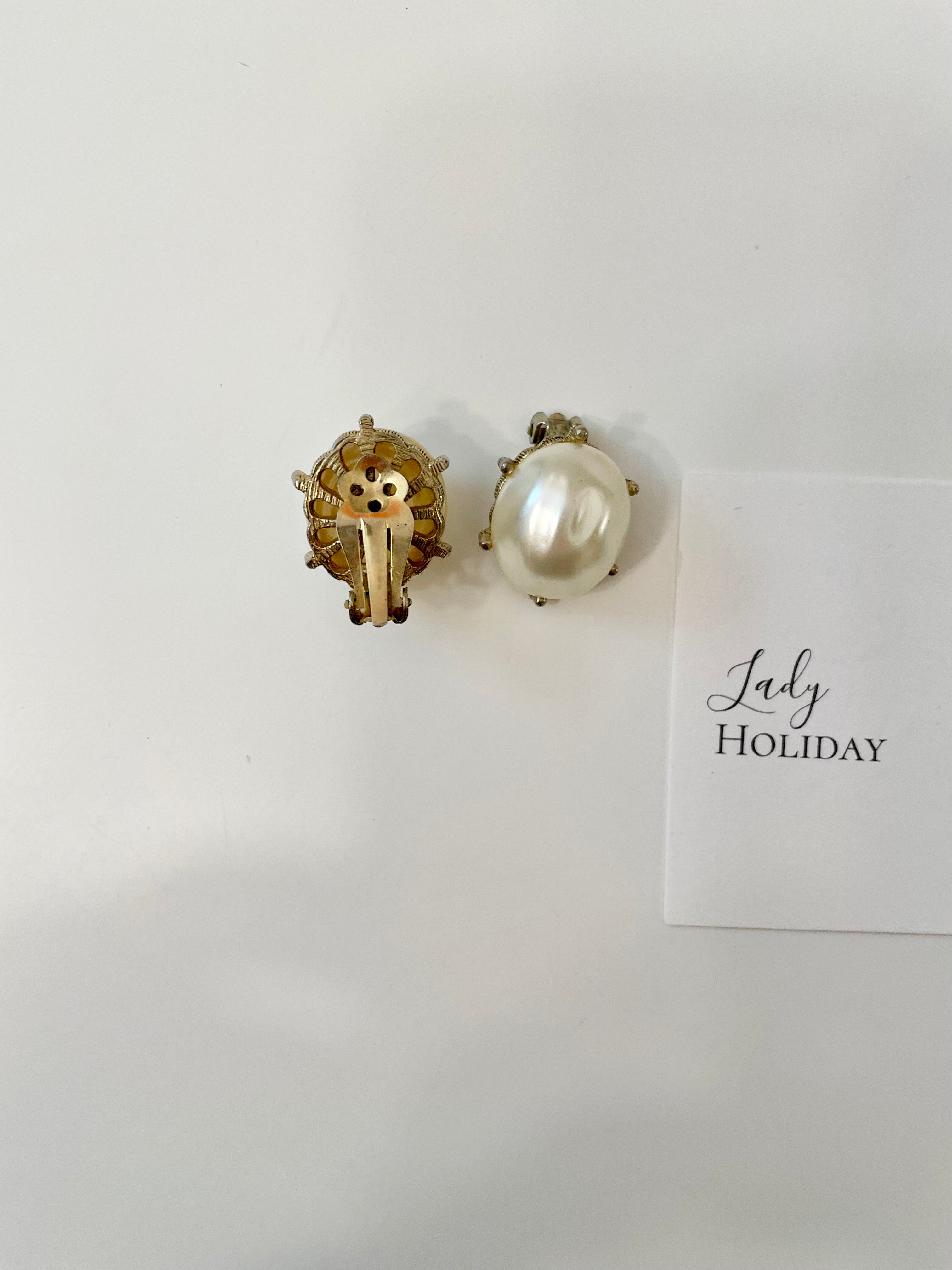 Vintage 1950's delightful faux baroque pearl clip earrings.... so lovely