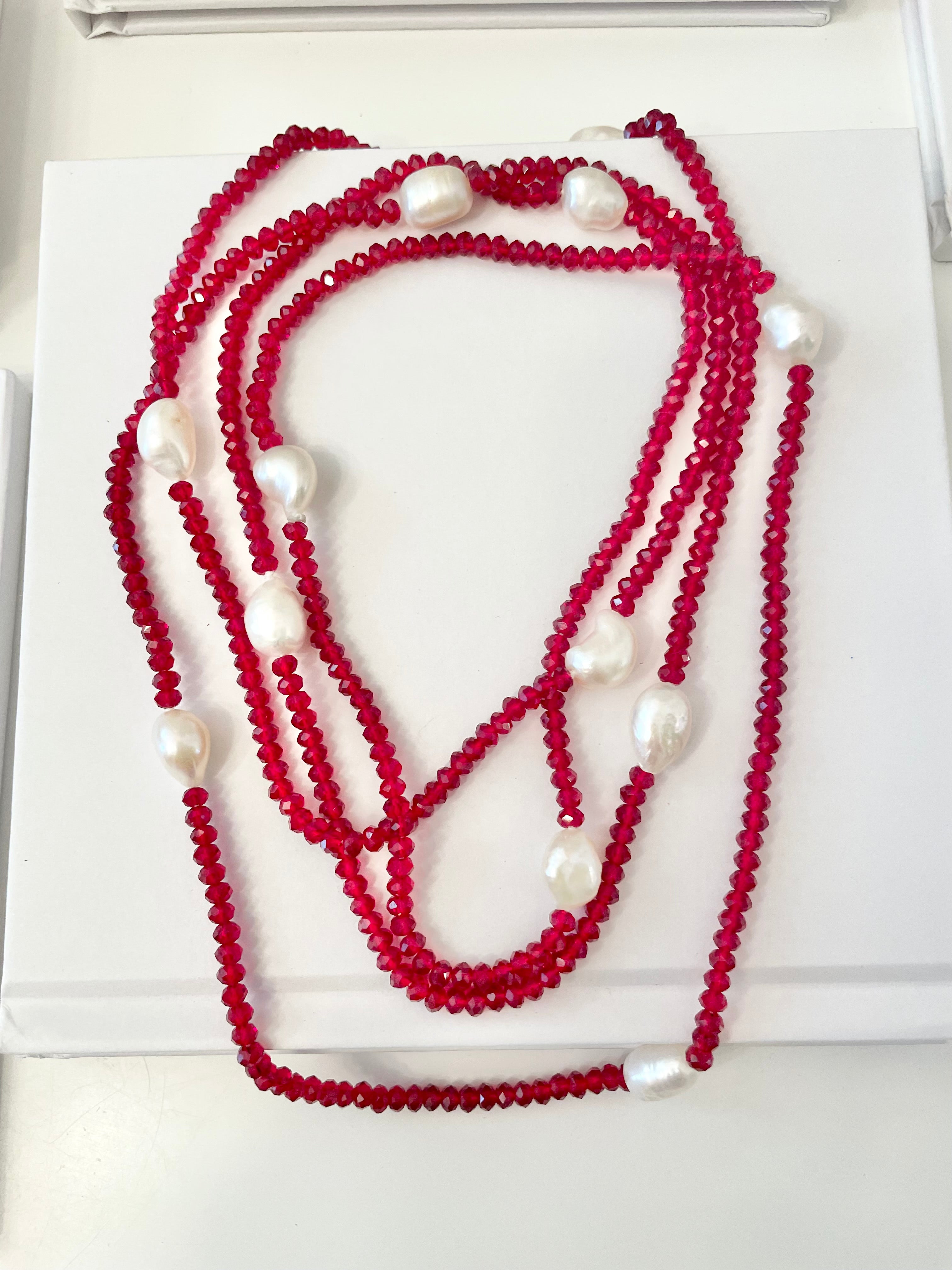 The ladies of Madison Ave adore a opera length set of pearls, and crystals.. so elegant