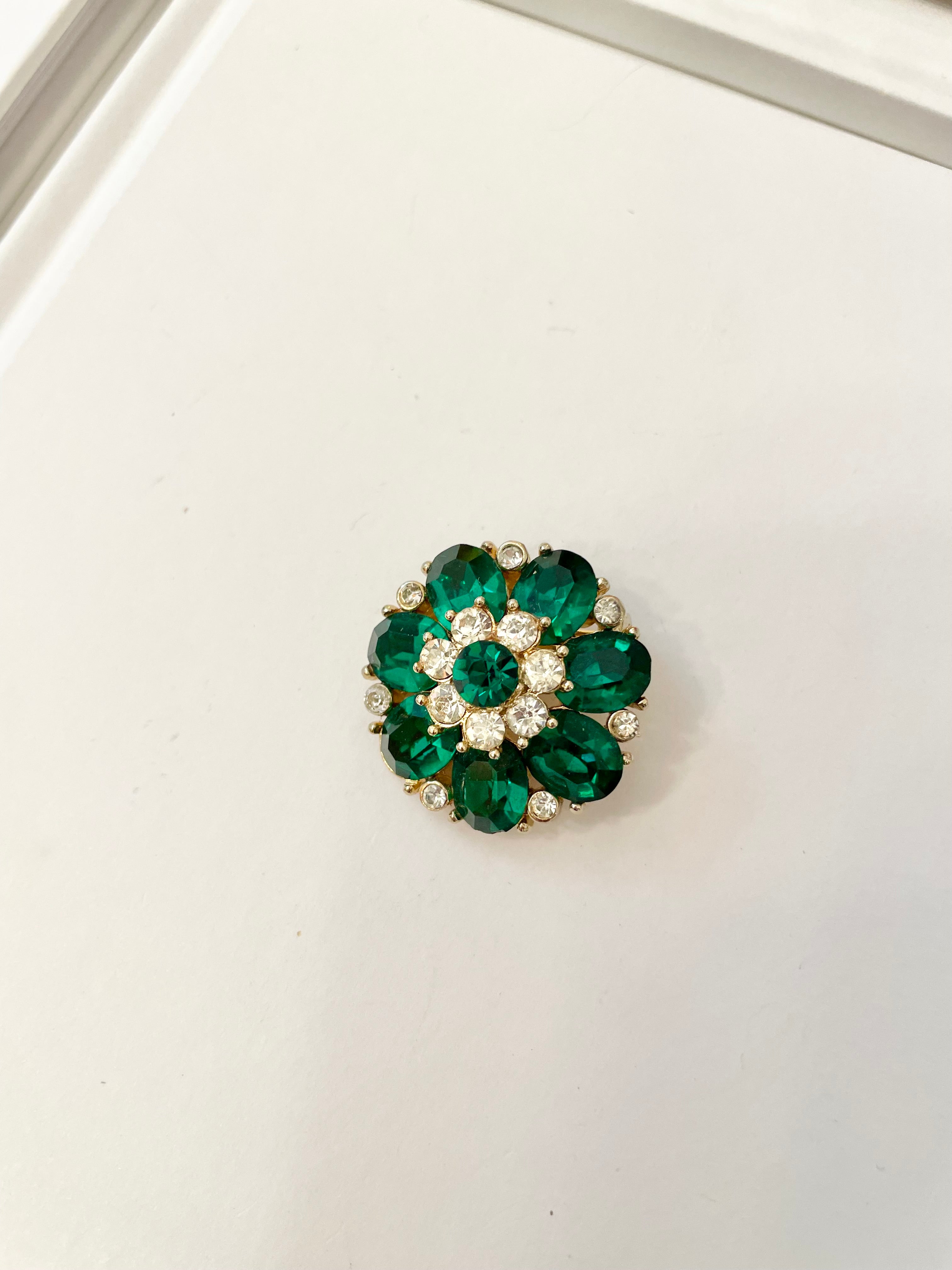 The prettiest petite emerald glass brooch.... so sweet