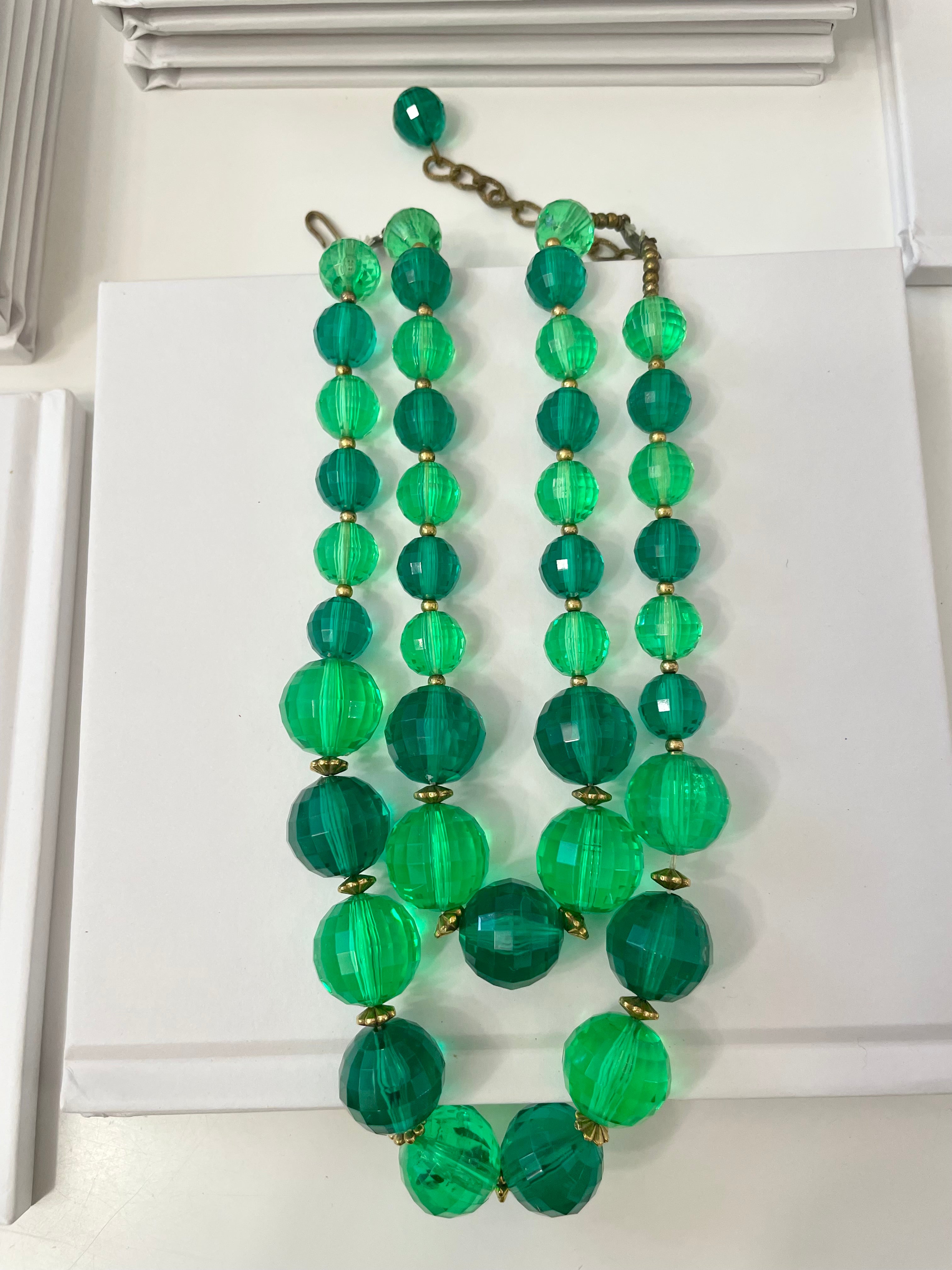 The Happy Hostess and her colorful life. This 1950's bright emerald, and bottle green faceted stone super chic necklace... this color is outstanding!!