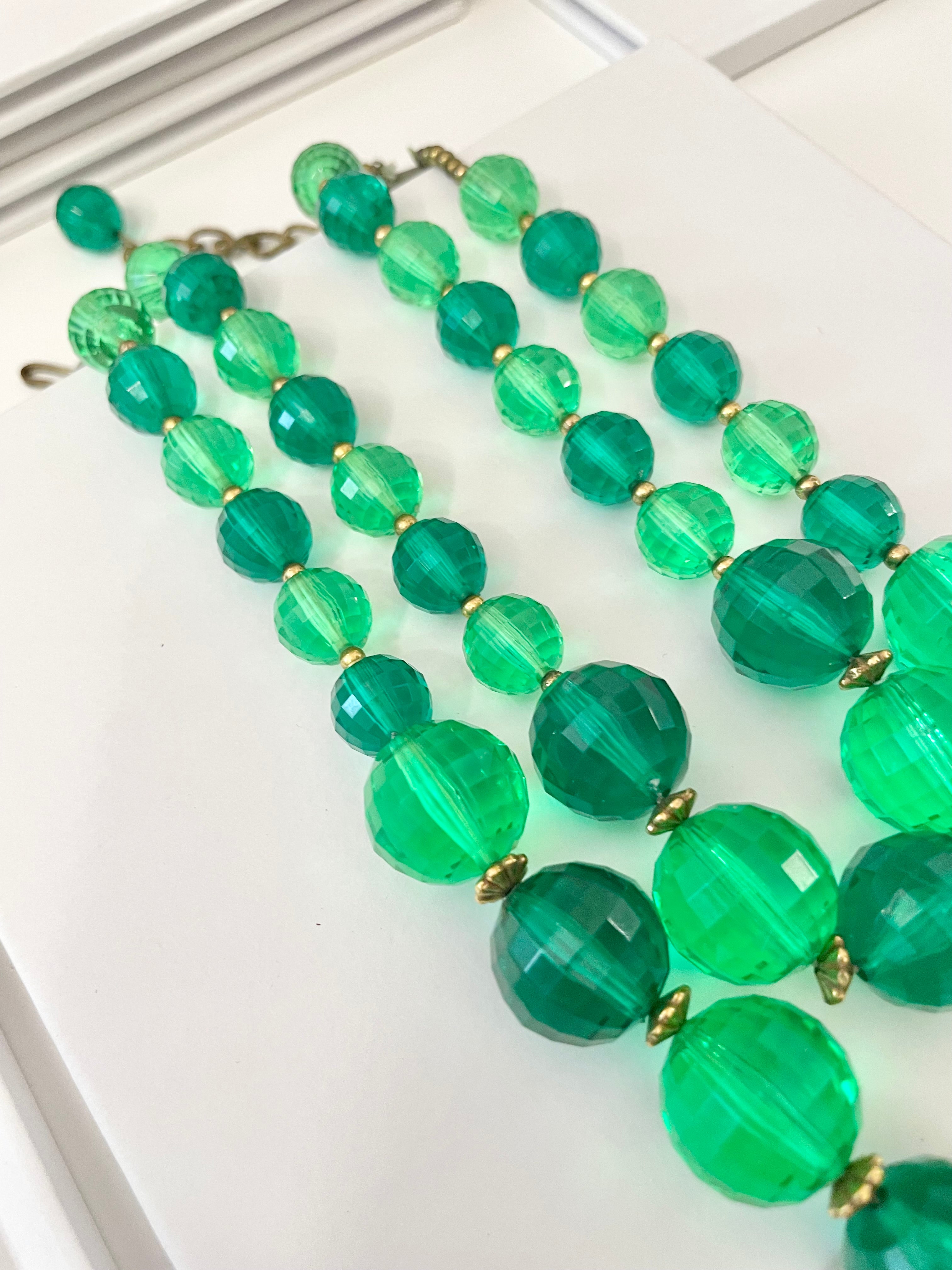The Happy Hostess and her colorful life. This 1950's bright emerald, and bottle green faceted stone super chic necklace... this color is outstanding!!