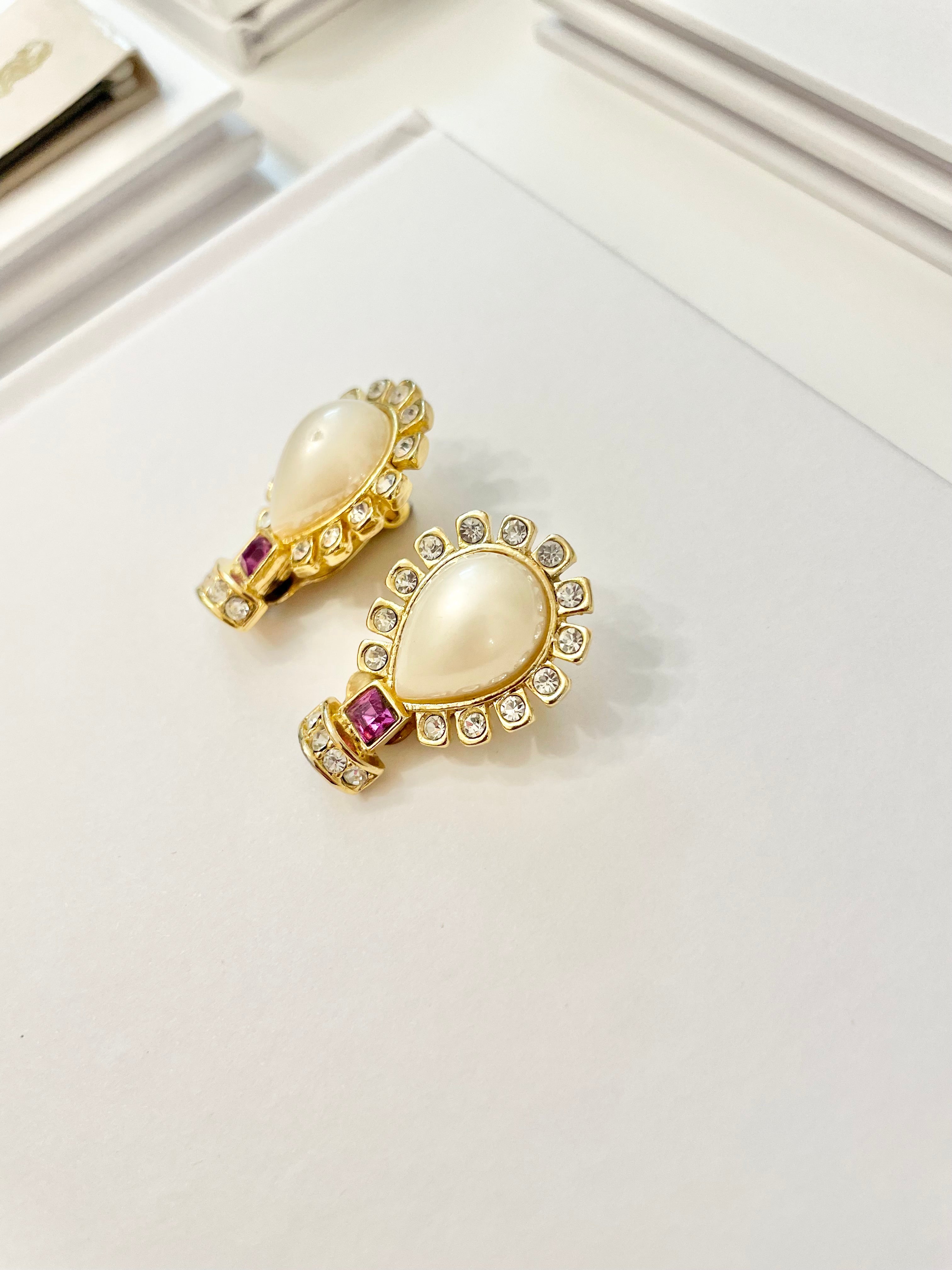 Isn't she charming... she loves a classic pearl earring with a pop of color..these 1980's delights are a true classic.