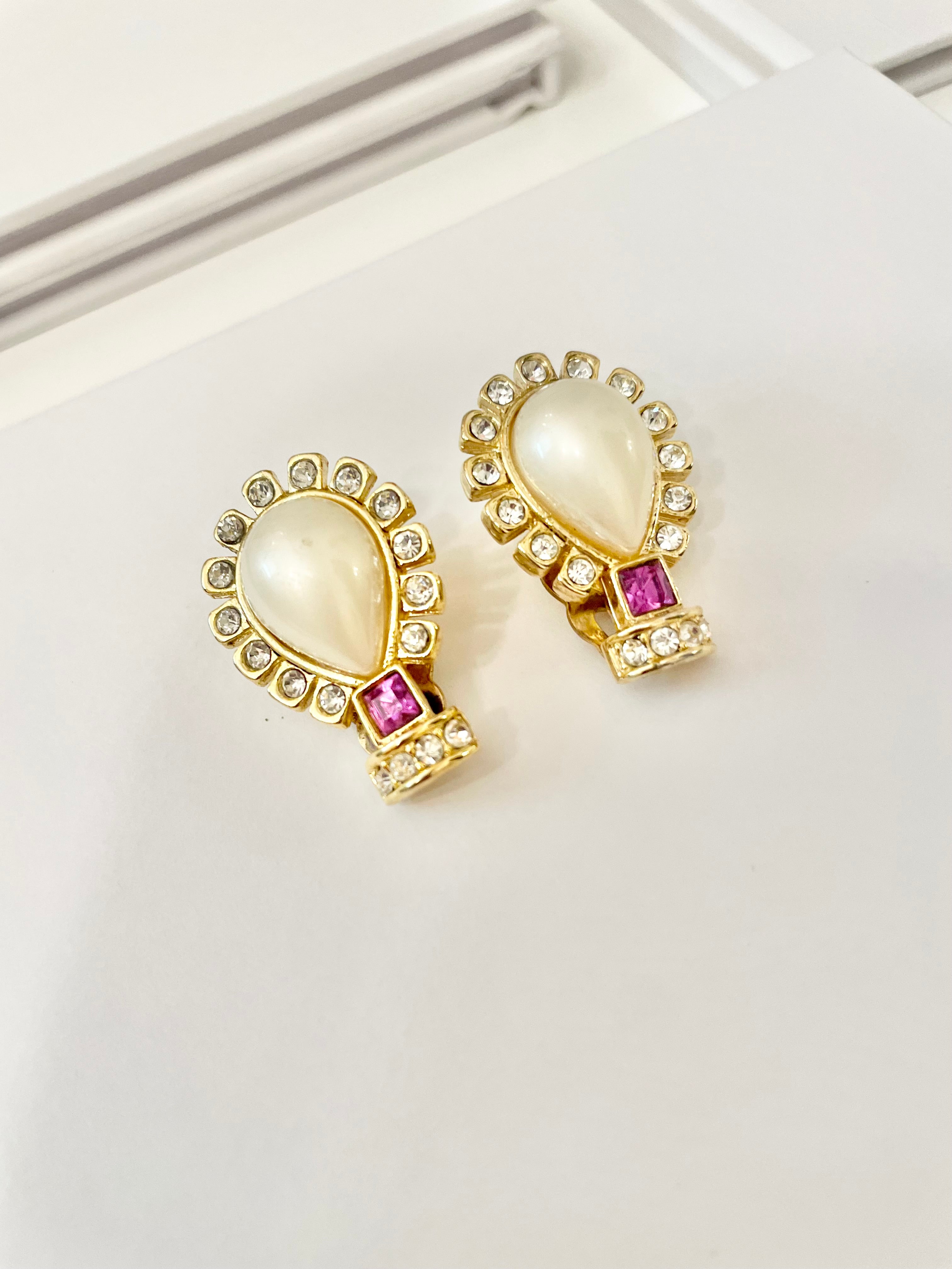 Isn't she charming... she loves a classic pearl earring with a pop of color..these 1980's delights are a true classic.