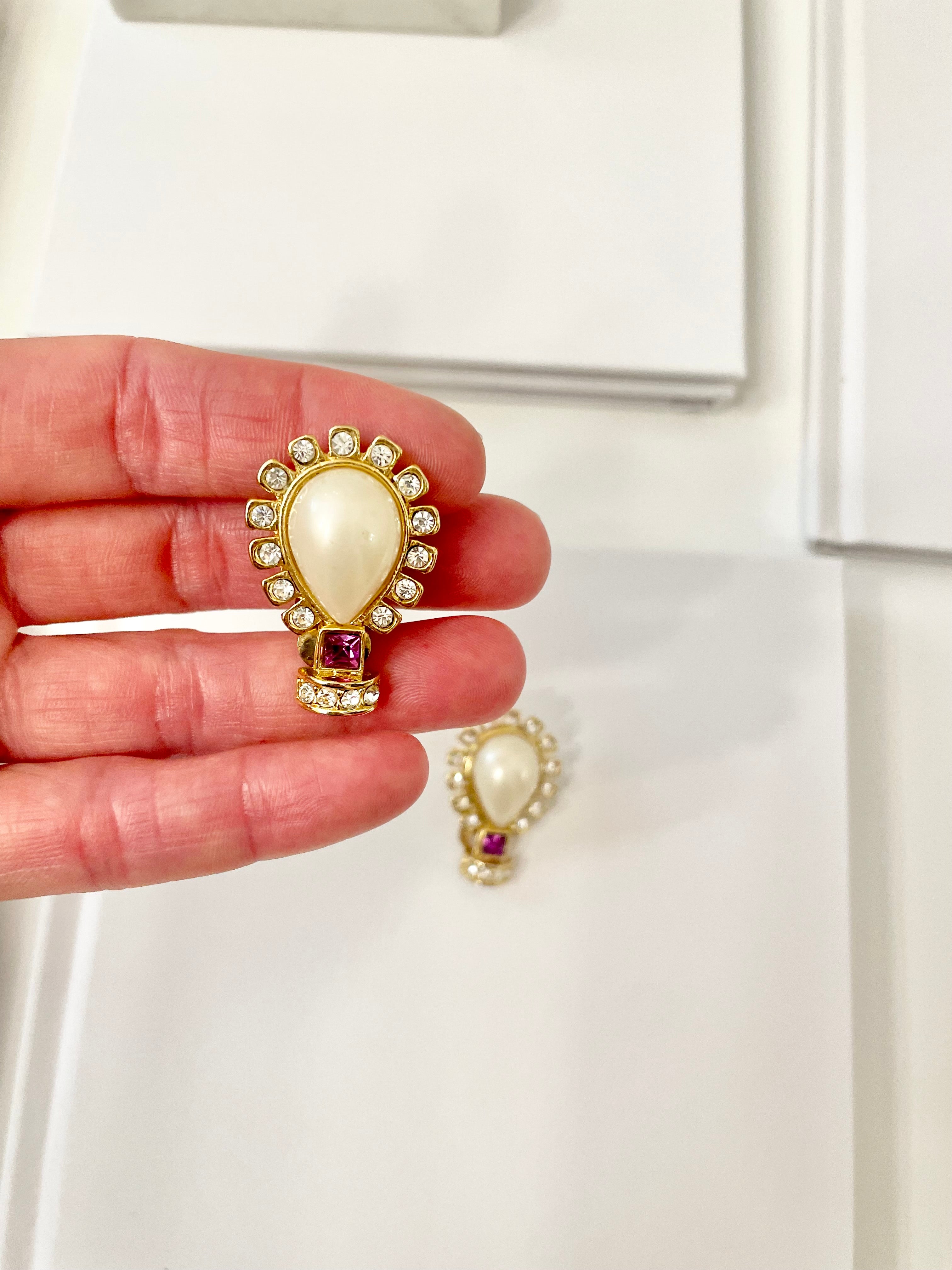 Isn't she charming... she loves a classic pearl earring with a pop of color..these 1980's delights are a true classic.