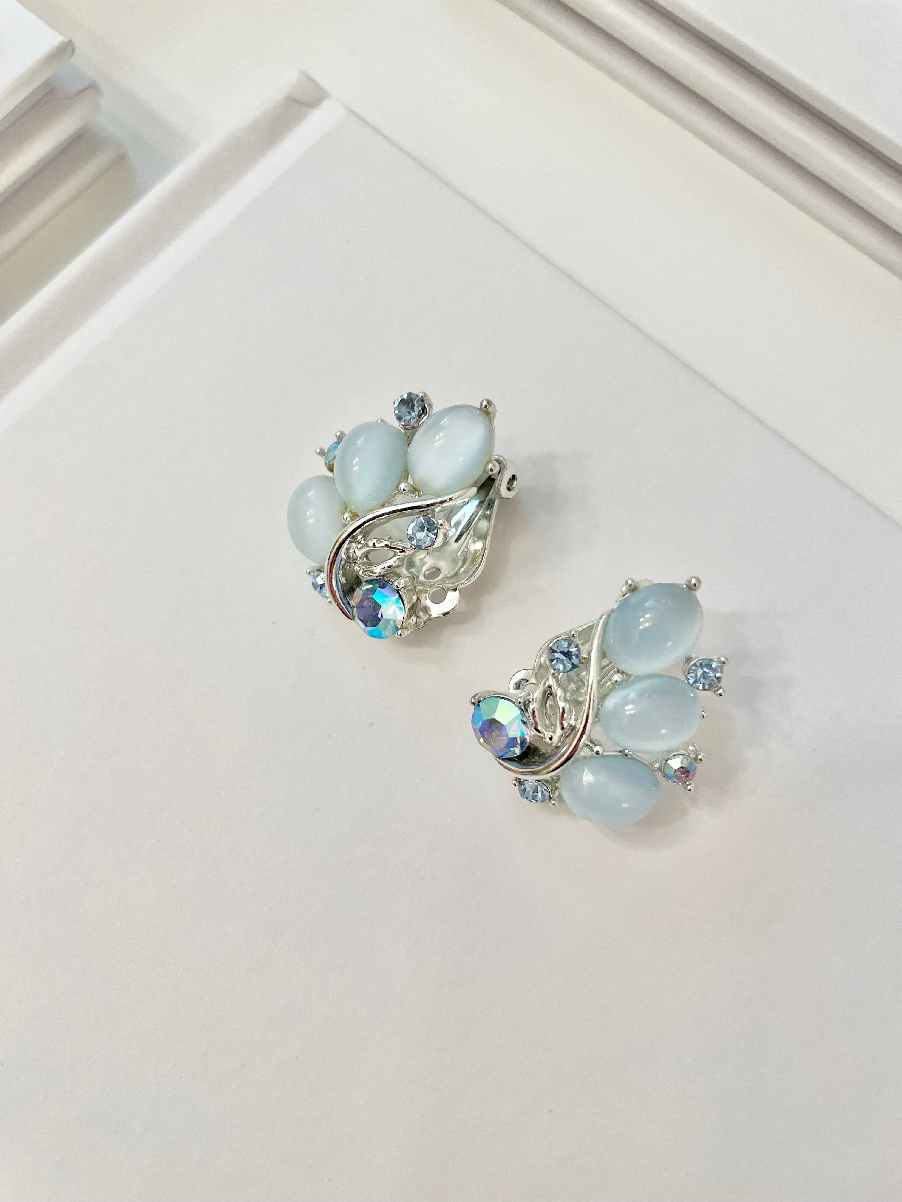 The feminine delights that are these Lisner soft blue moon glow earrings.. speak to many ladies hearts! the perfect colors..