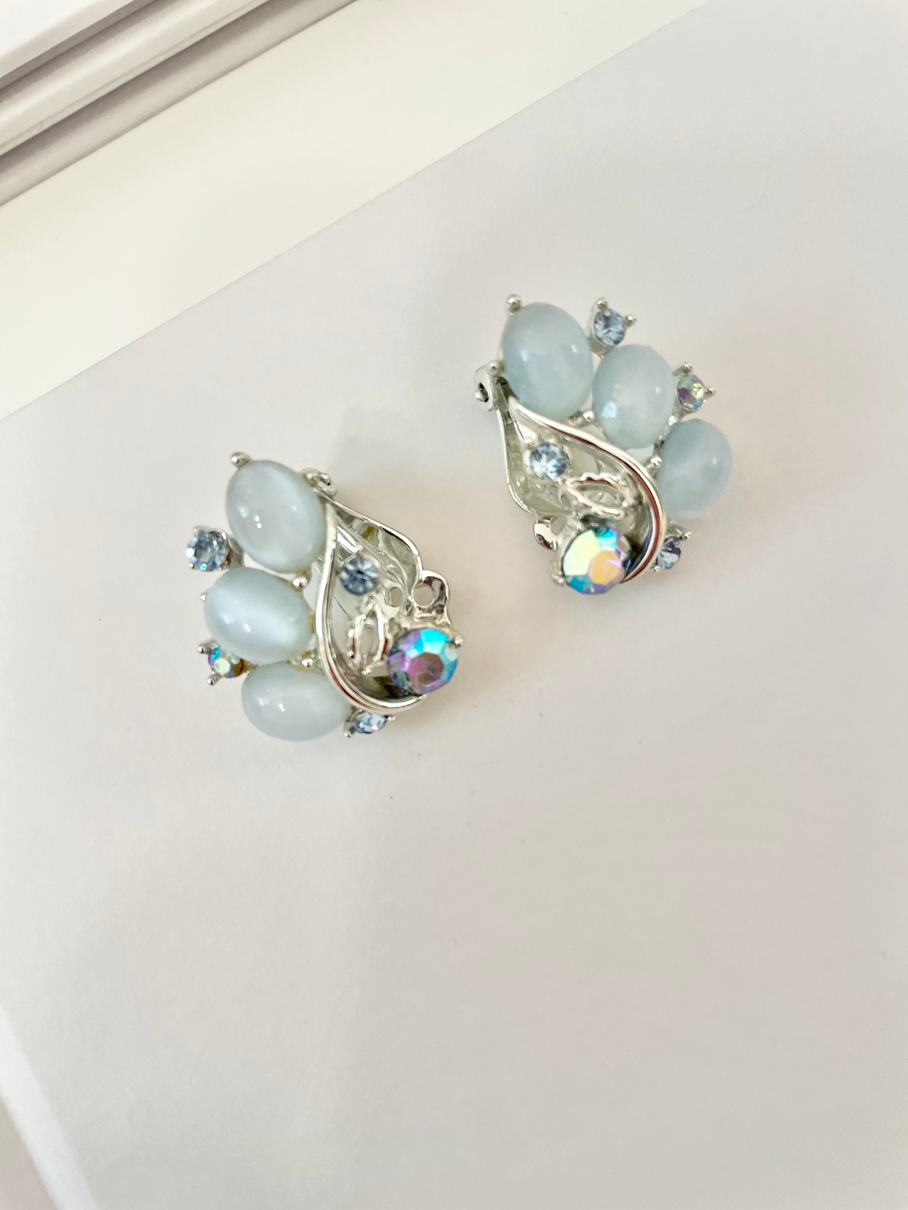 The feminine delights that are these Lisner soft blue moon glow earrings.. speak to many ladies hearts! the perfect colors..