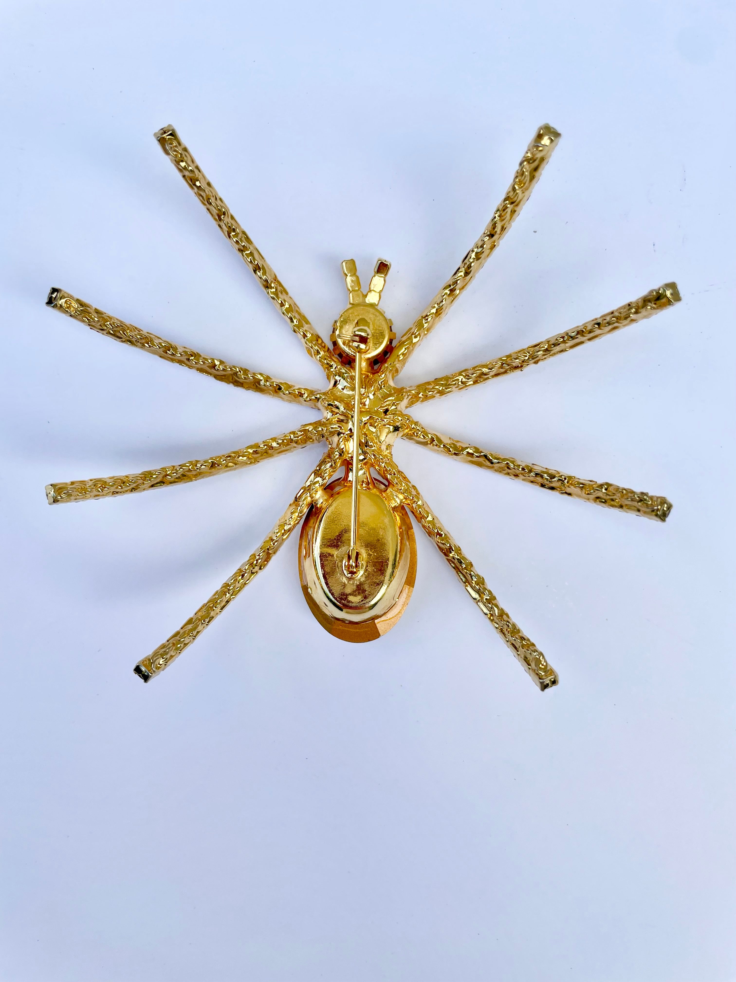 The Cheeky lady loves a dramatic brooch, this spider is a conversation piece!