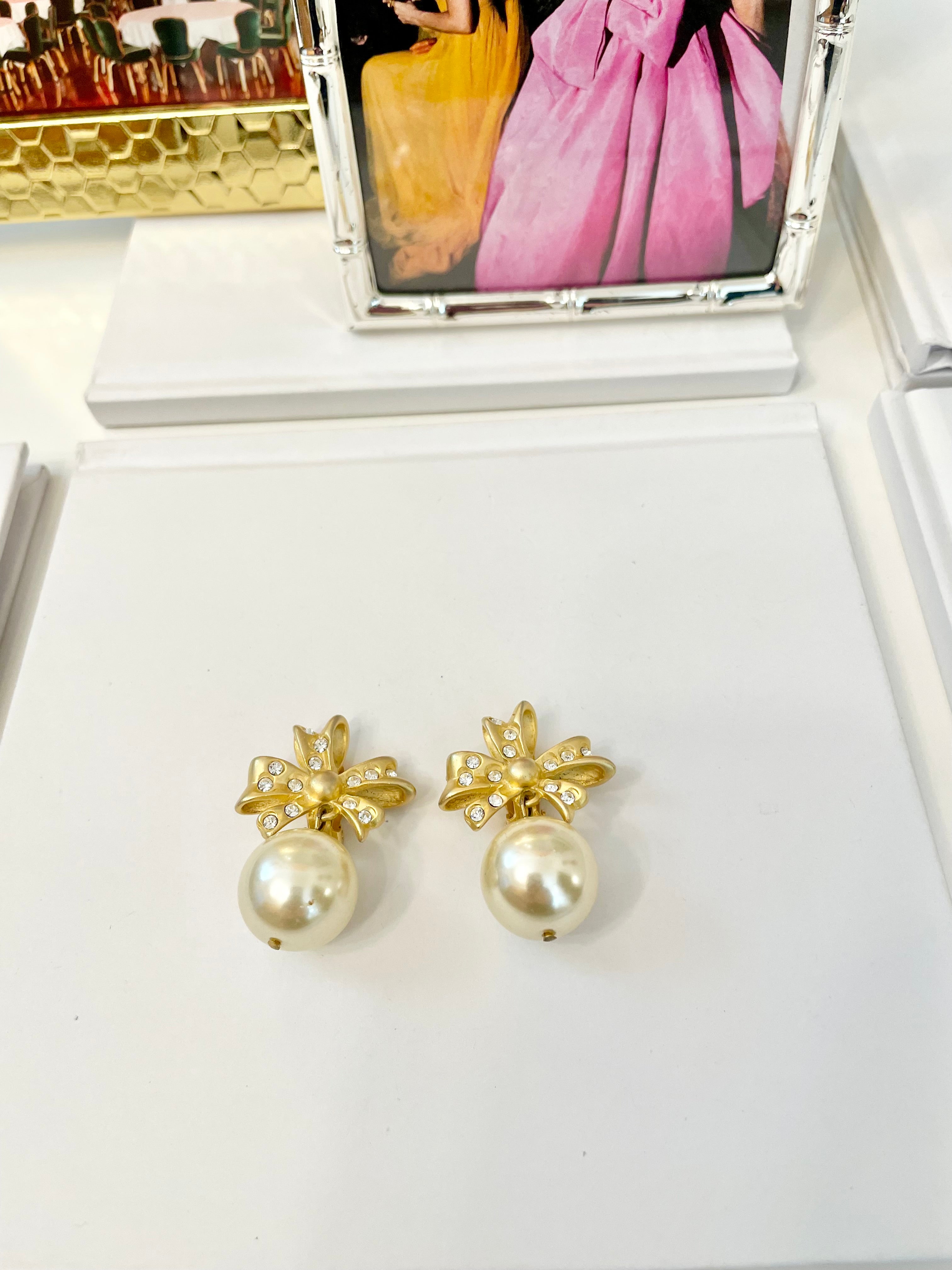 The charming gal loves only pearls! These drop earings are truly divine!!